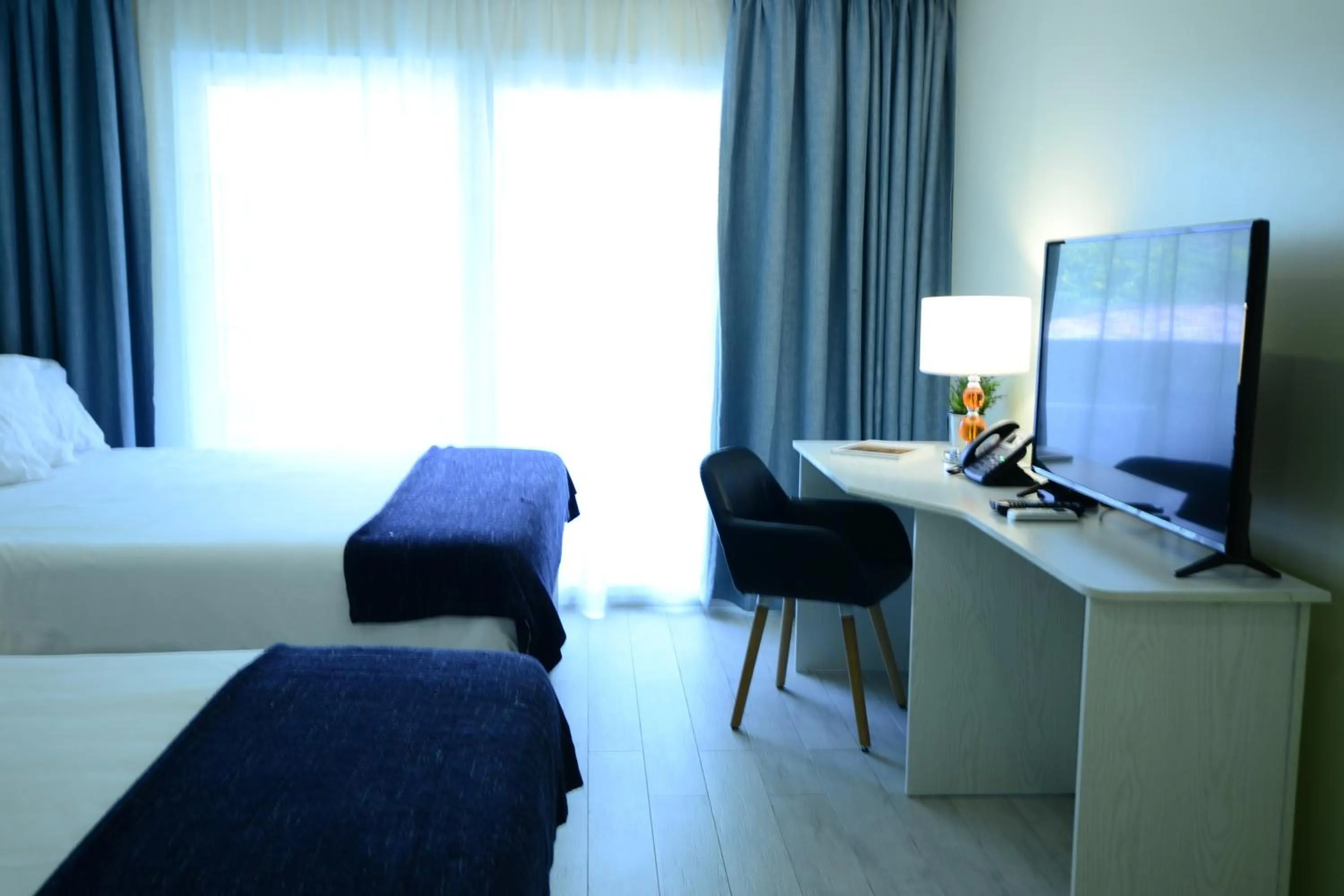 TV and multimedia, Bed in Quints Travelers Inn