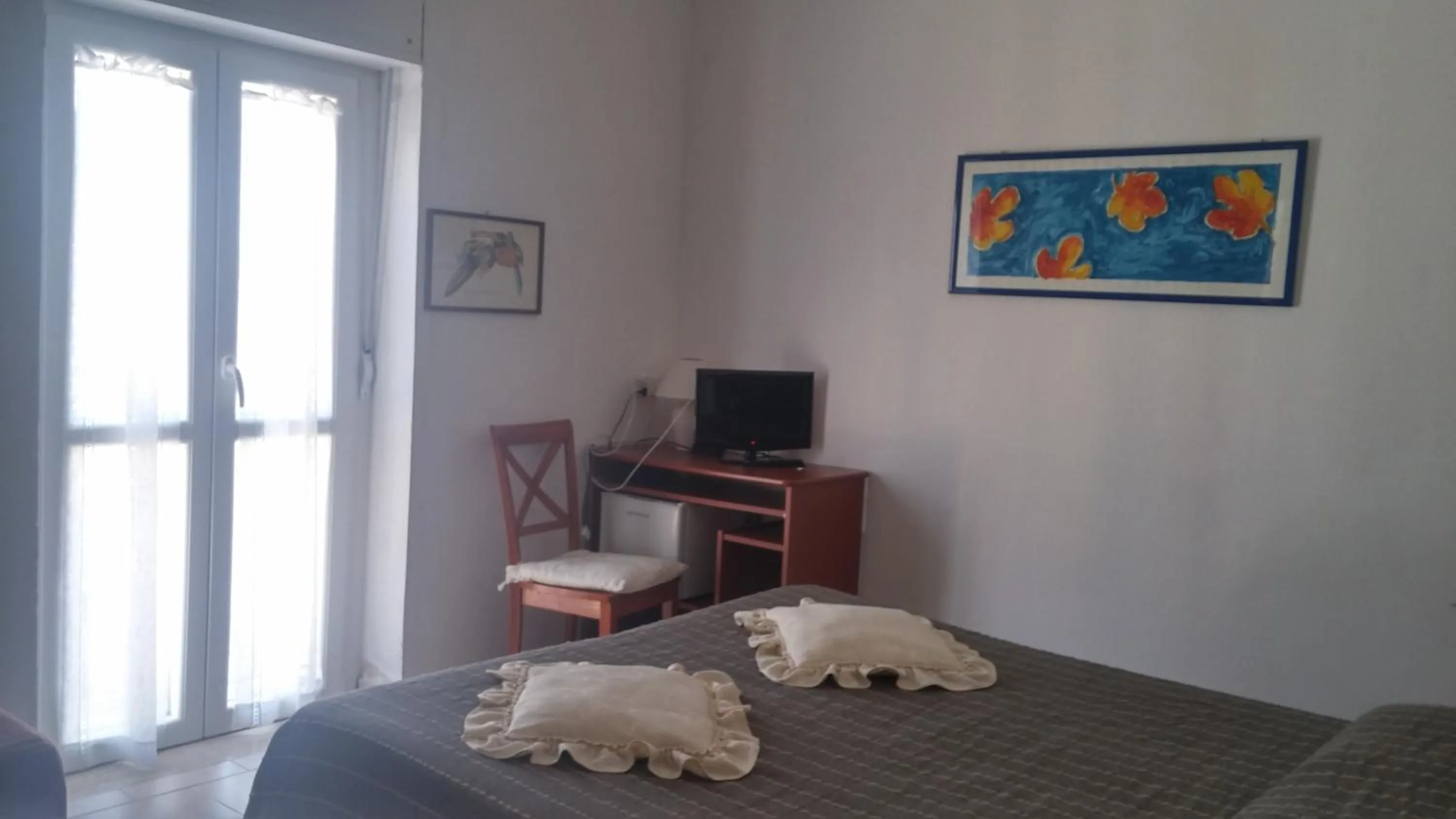 Bed in Hotel Ariston