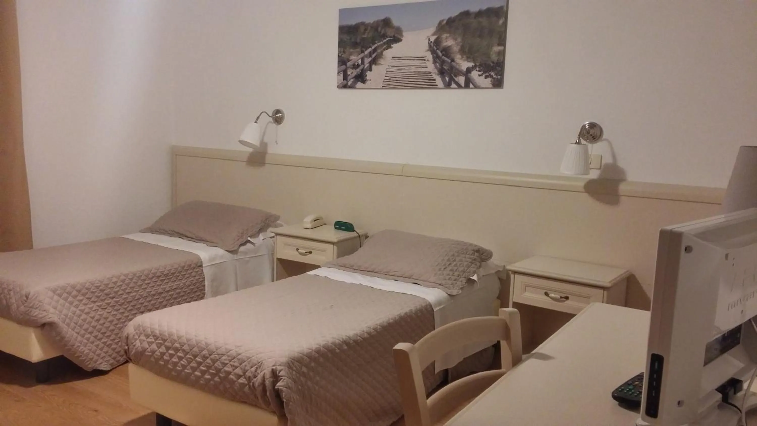 Bed in Hotel Ariston