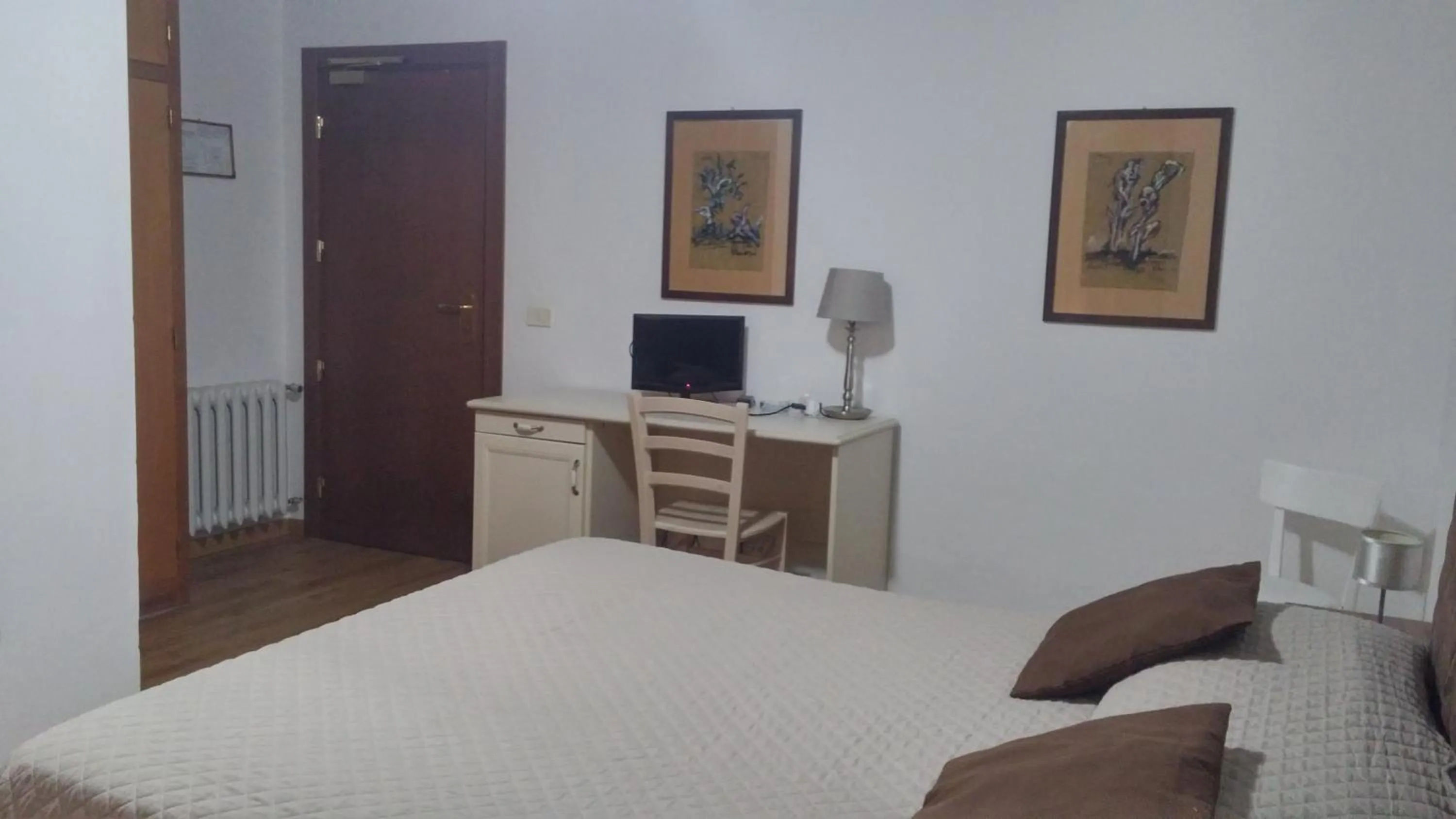 Bed in Hotel Ariston