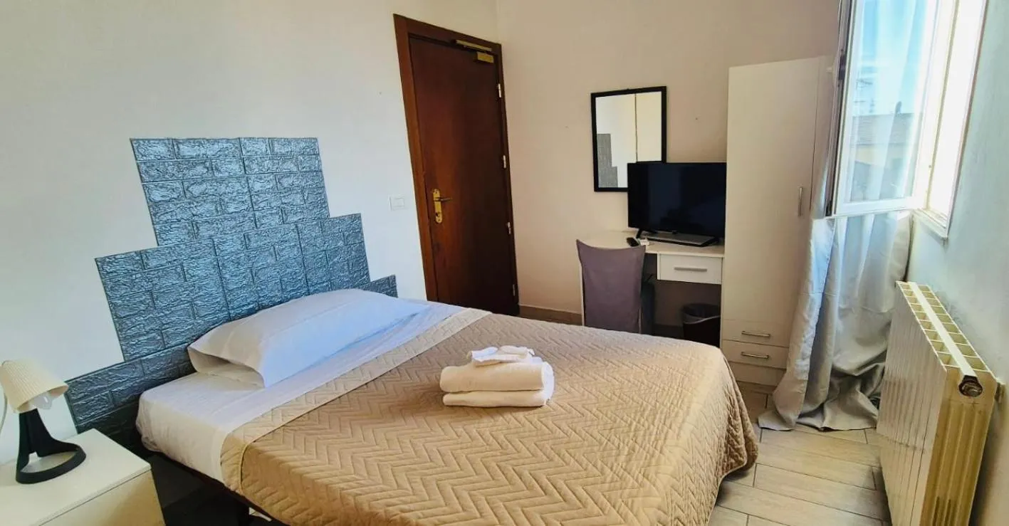 Bed in Hotel Ariston