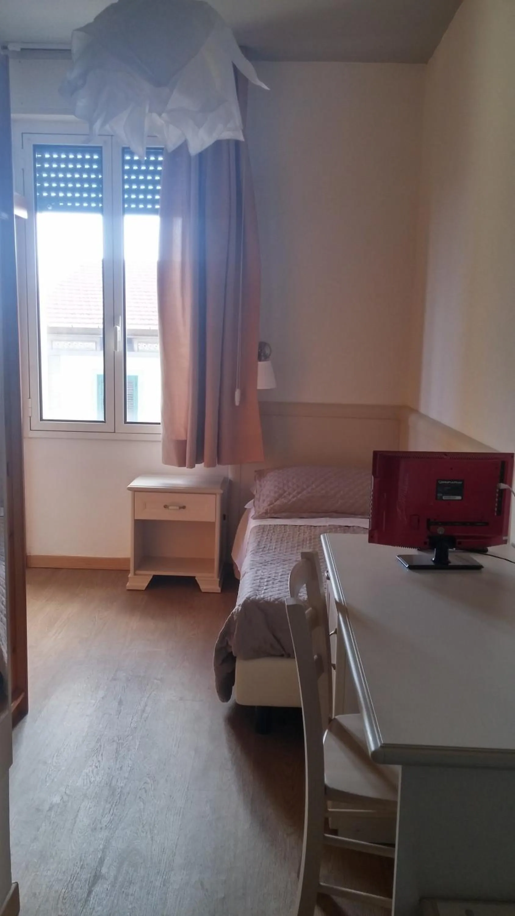 Bed in Hotel Ariston