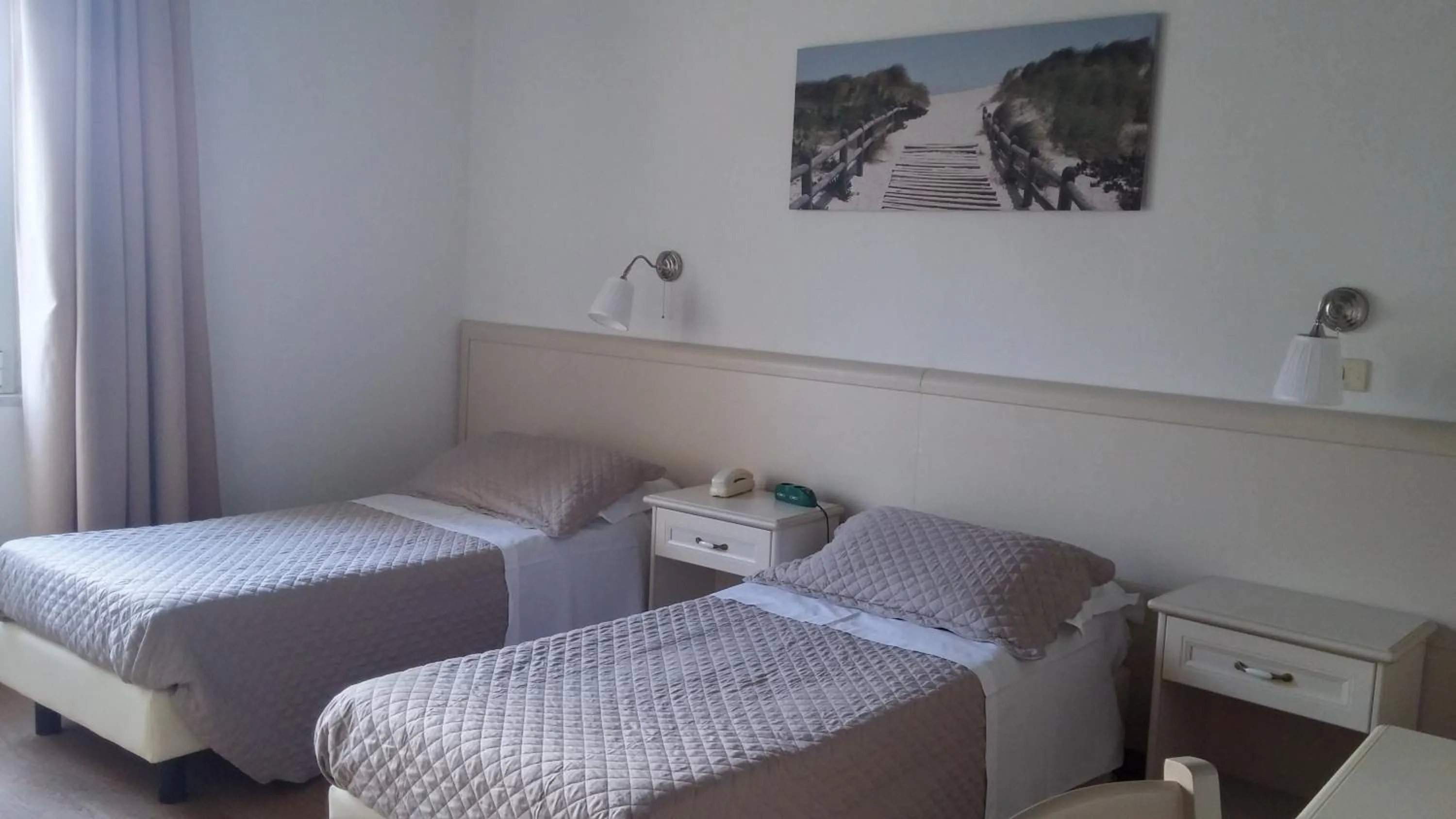 Bed in Hotel Ariston