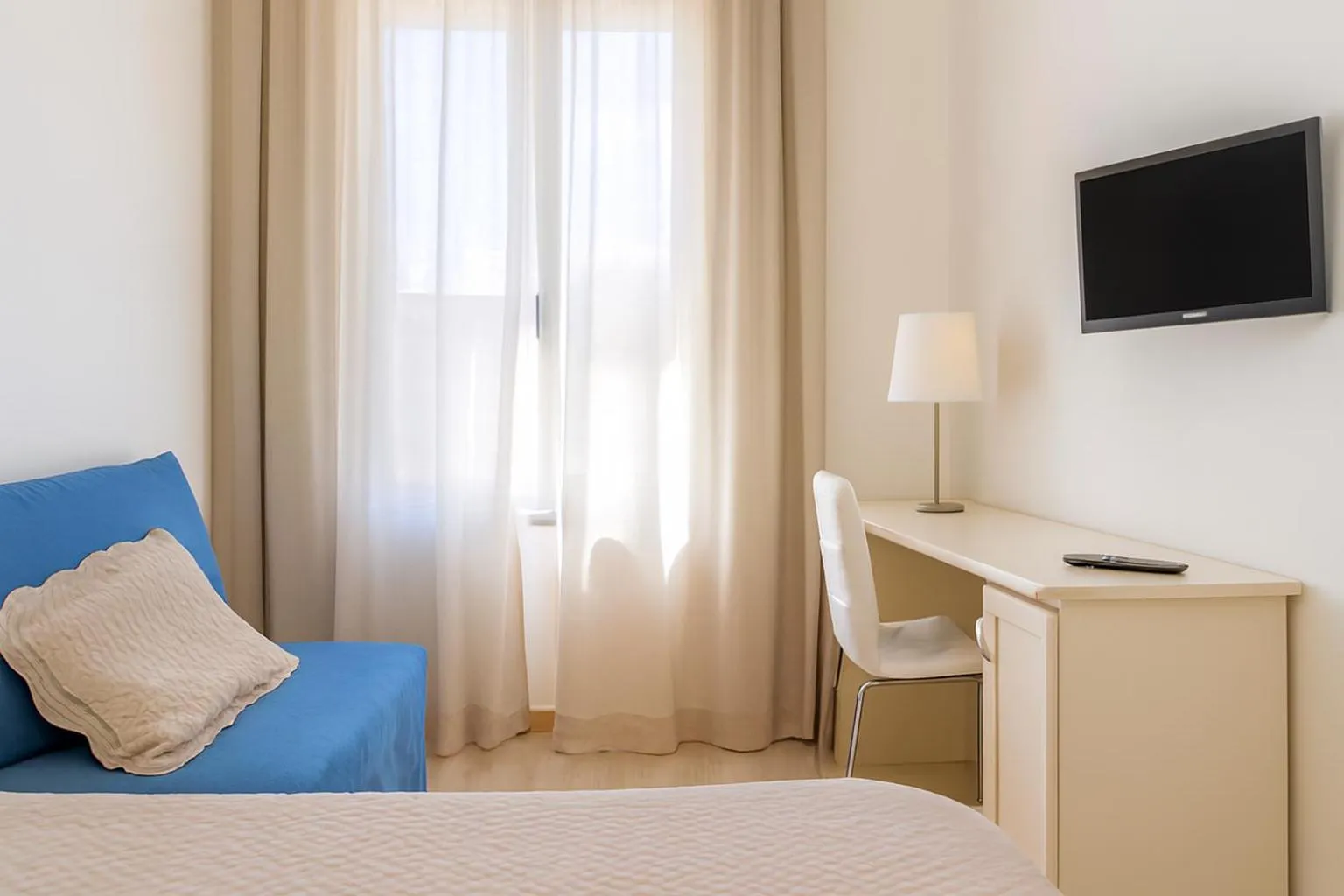 Bed in Hotel Ariston