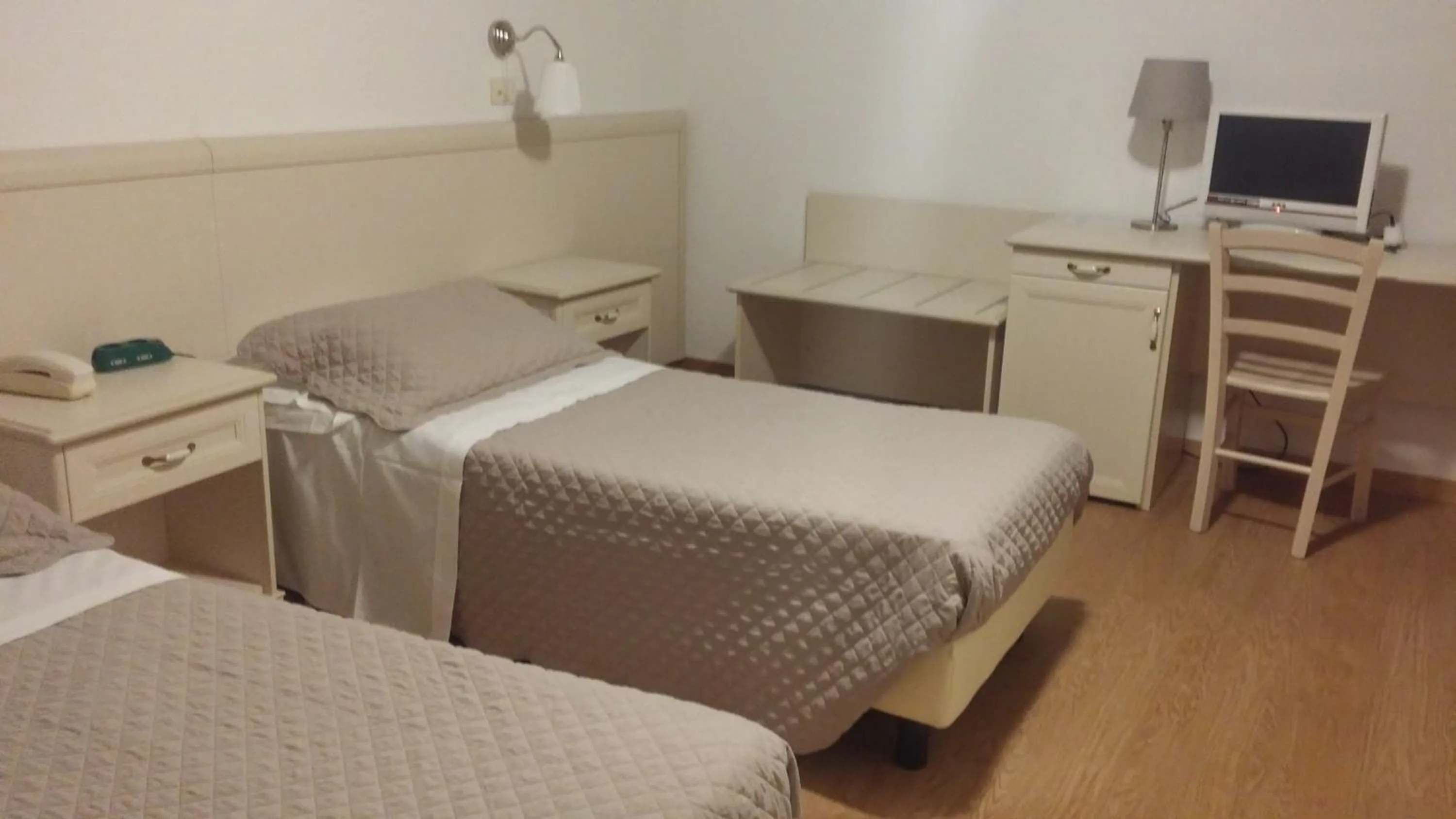 Bed in Hotel Ariston