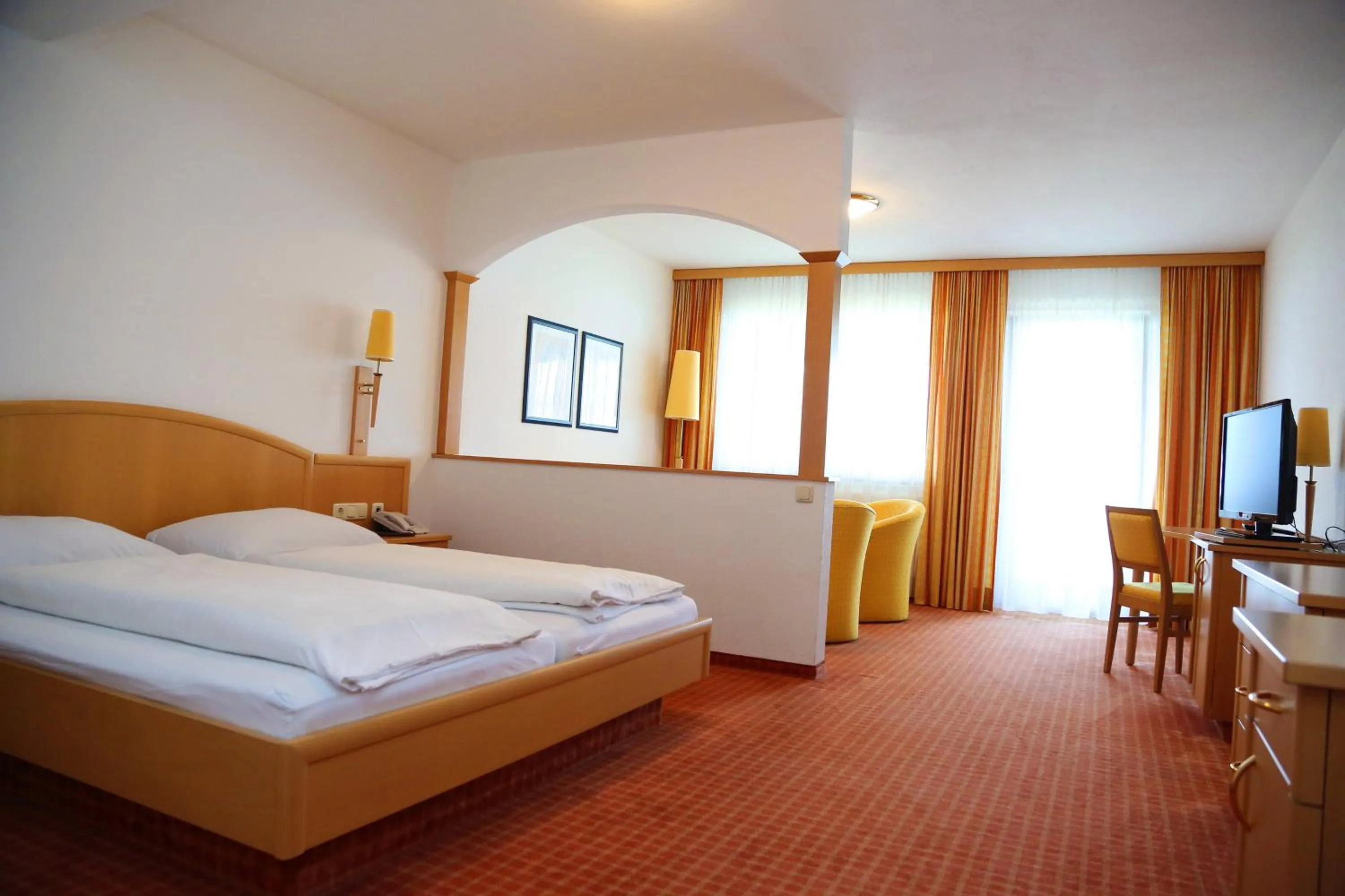 Bed in Seegasthof Hois'n Wirt - Hotel mit Wellnessbereich