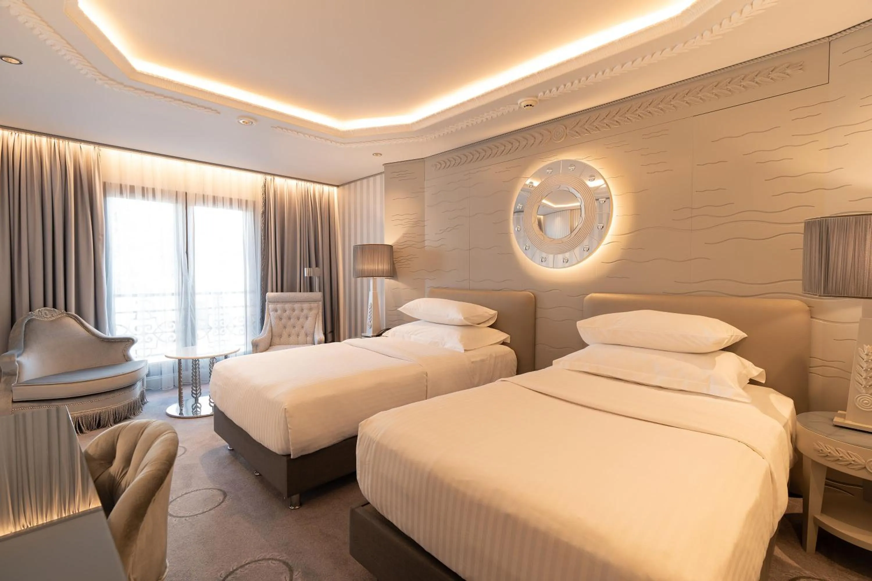 Bed in Wyndham Grand Istanbul Kalamış Marina Hotel