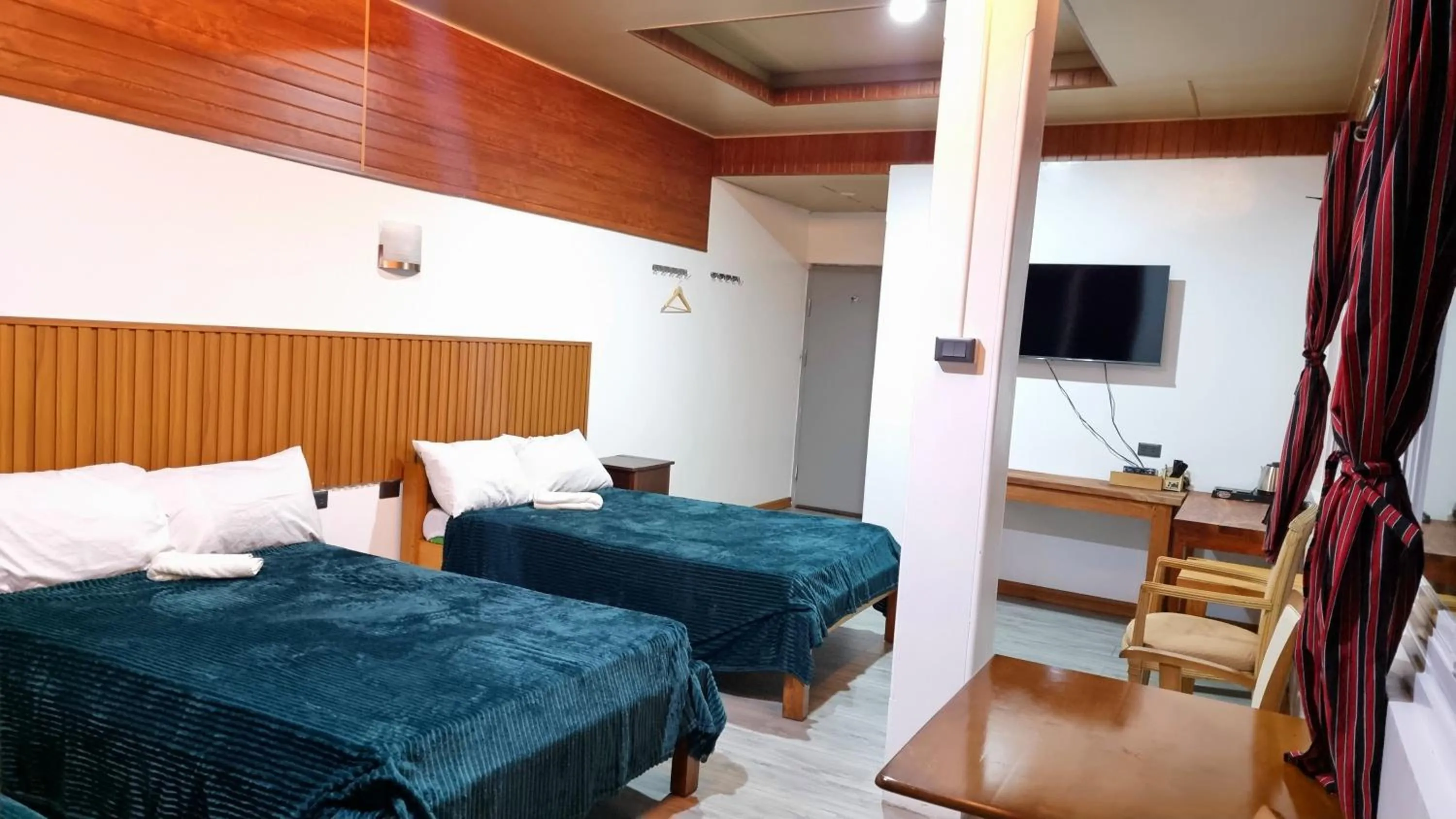 Bed in Wanay's Rocky Mountain Homestay