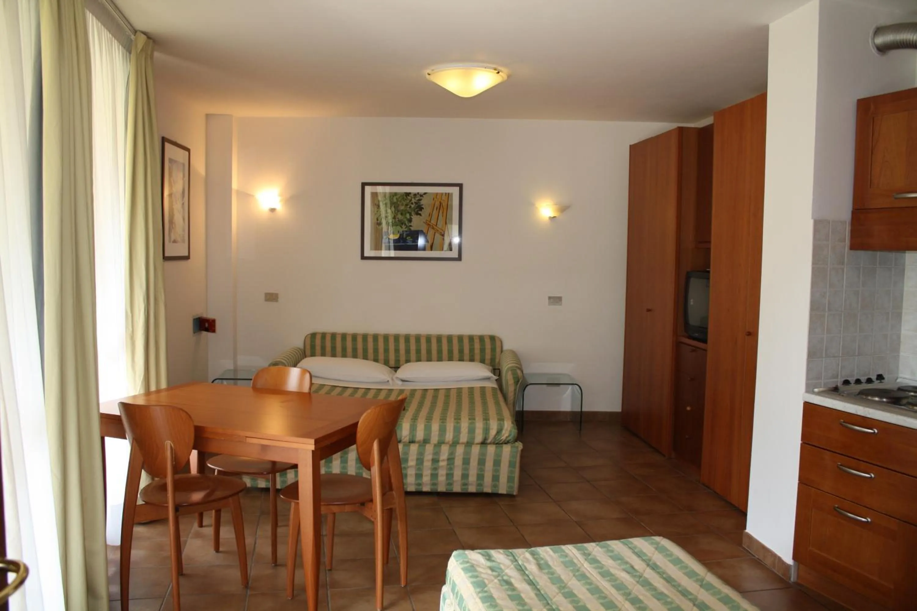 Living room, Bed in Residence Campo Smith