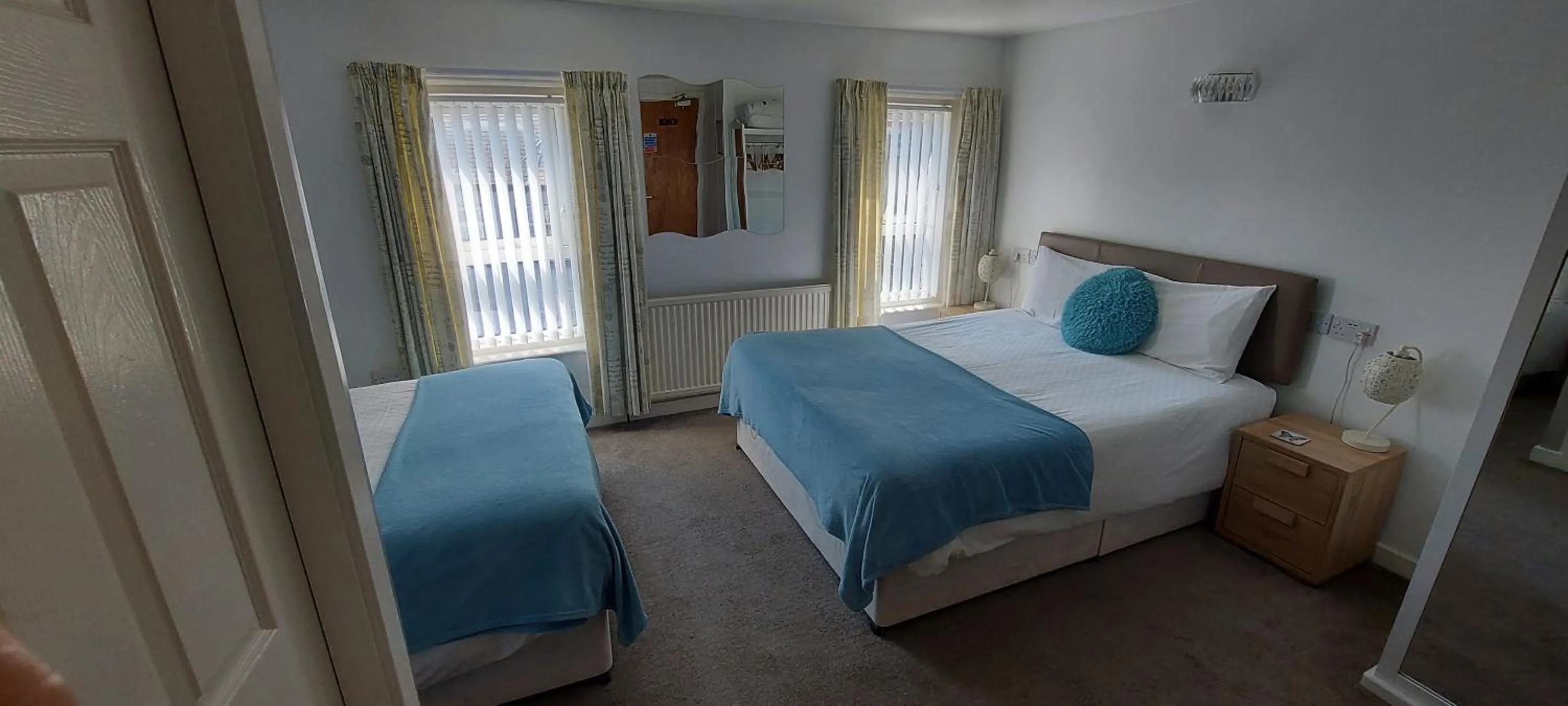 Bed in Four Seasons Guest House