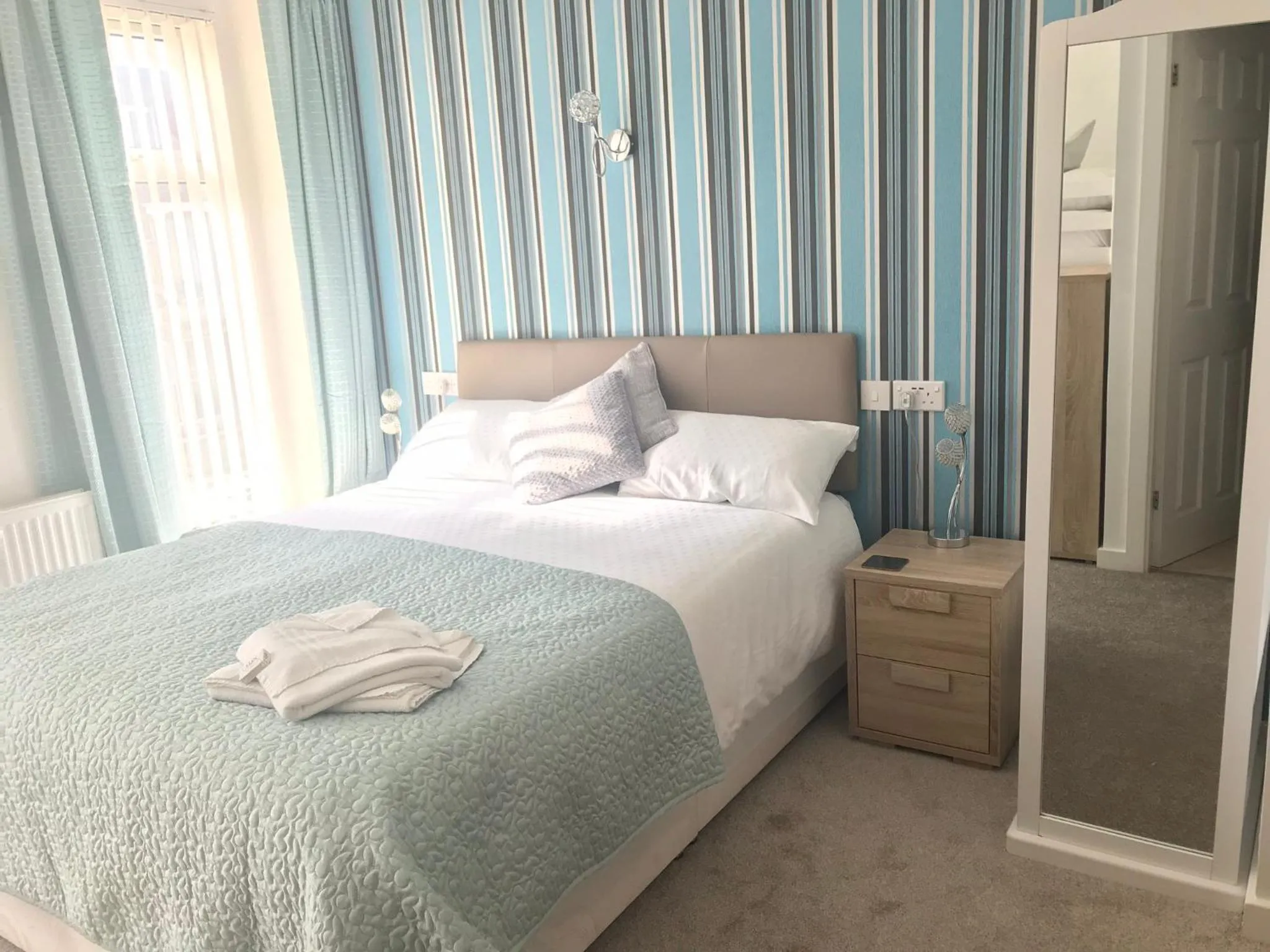 Bed in Four Seasons Guest House