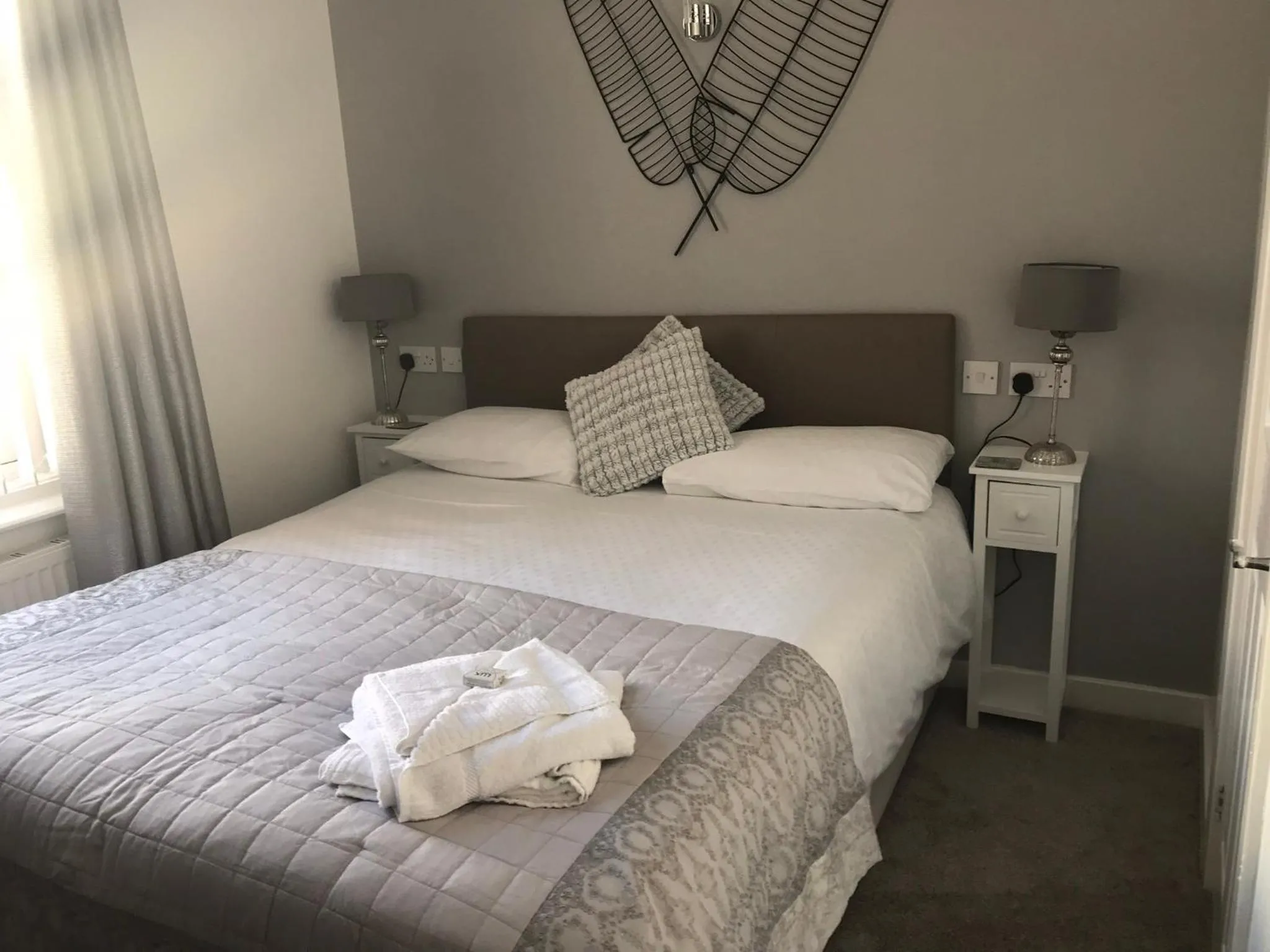 Bed in Four Seasons Guest House
