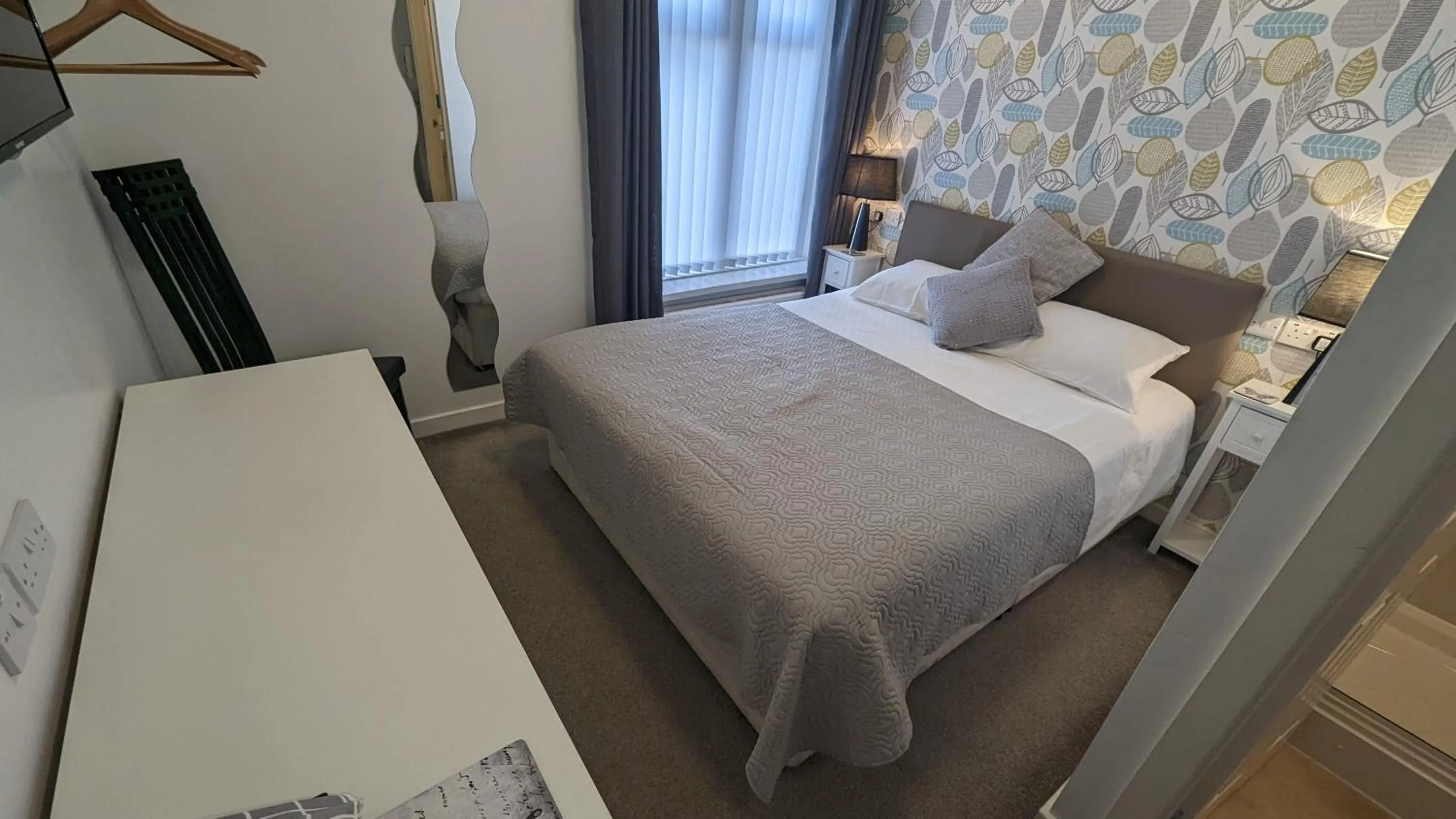 Bed in Four Seasons Guest House