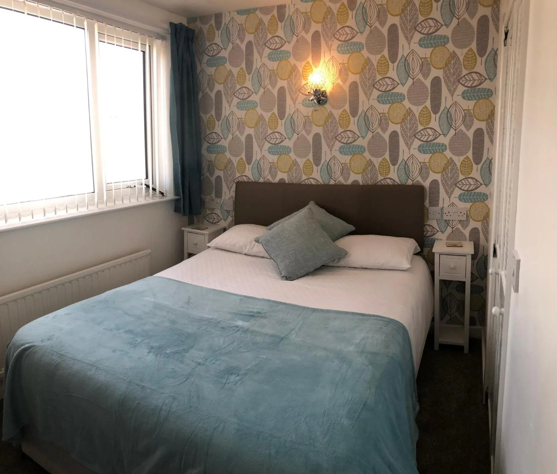 Photo of the whole room, Bed in Four Seasons Guest House