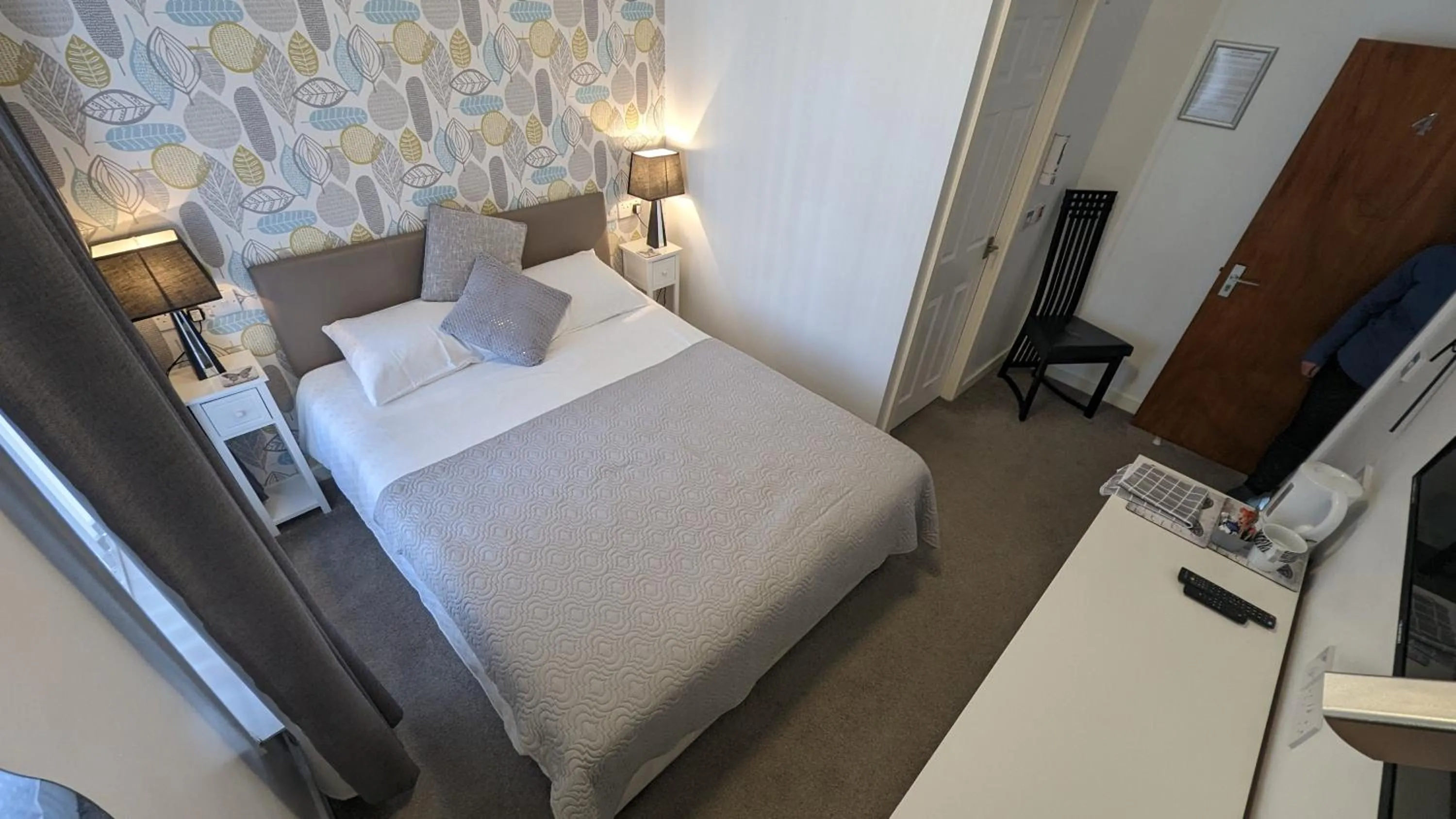 Bed in Four Seasons Guest House