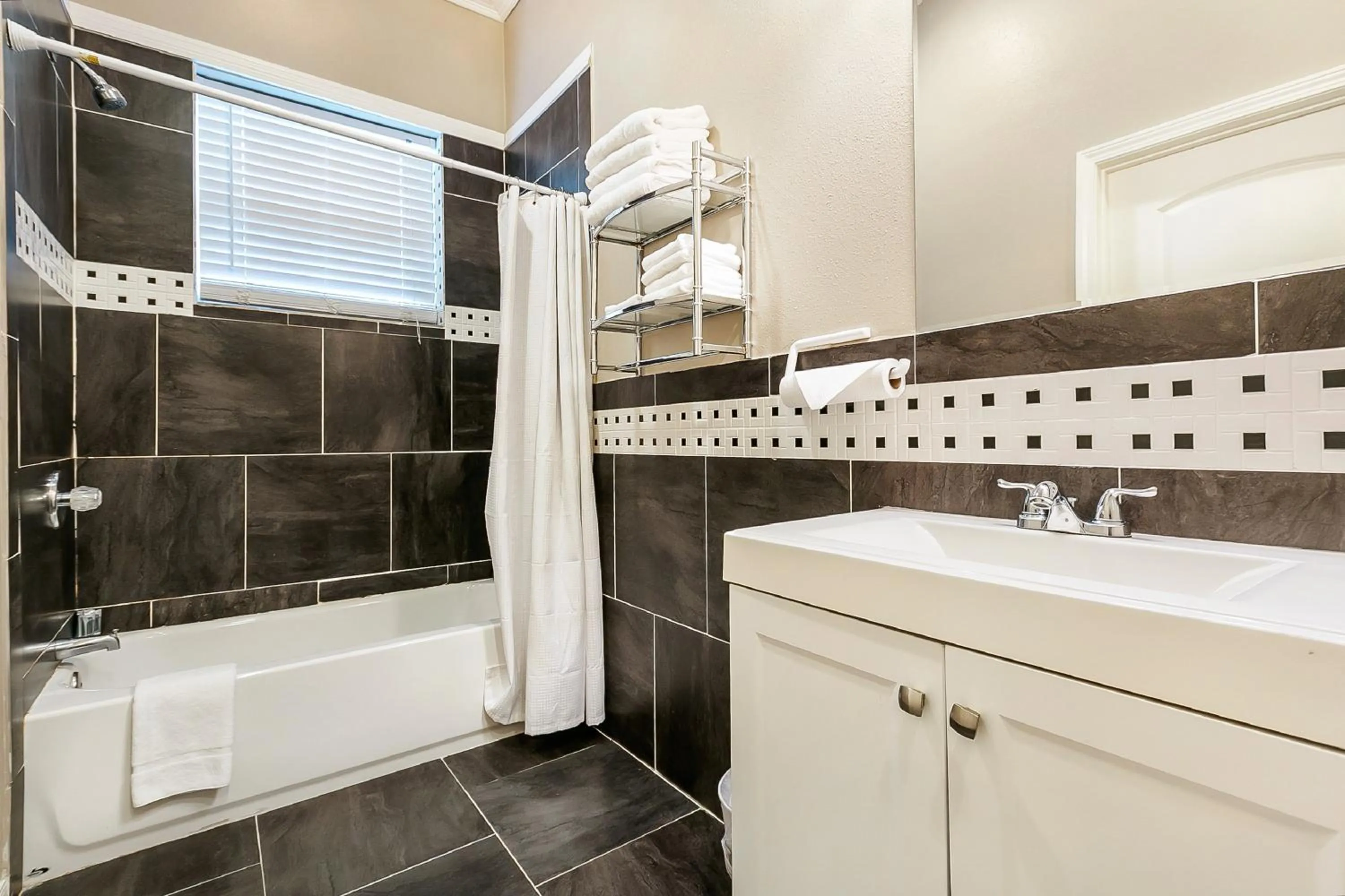 Bathroom in Inviting 3BR Condo steps from St Charles Ave