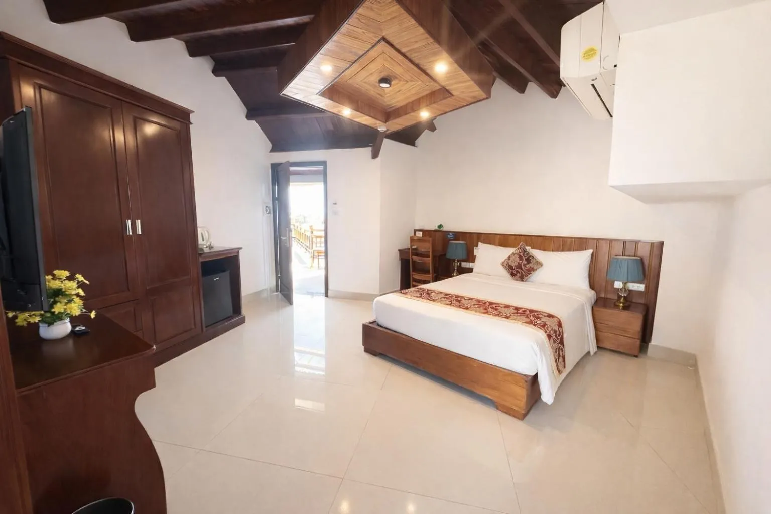 Bed in Threeway Riverside Villa