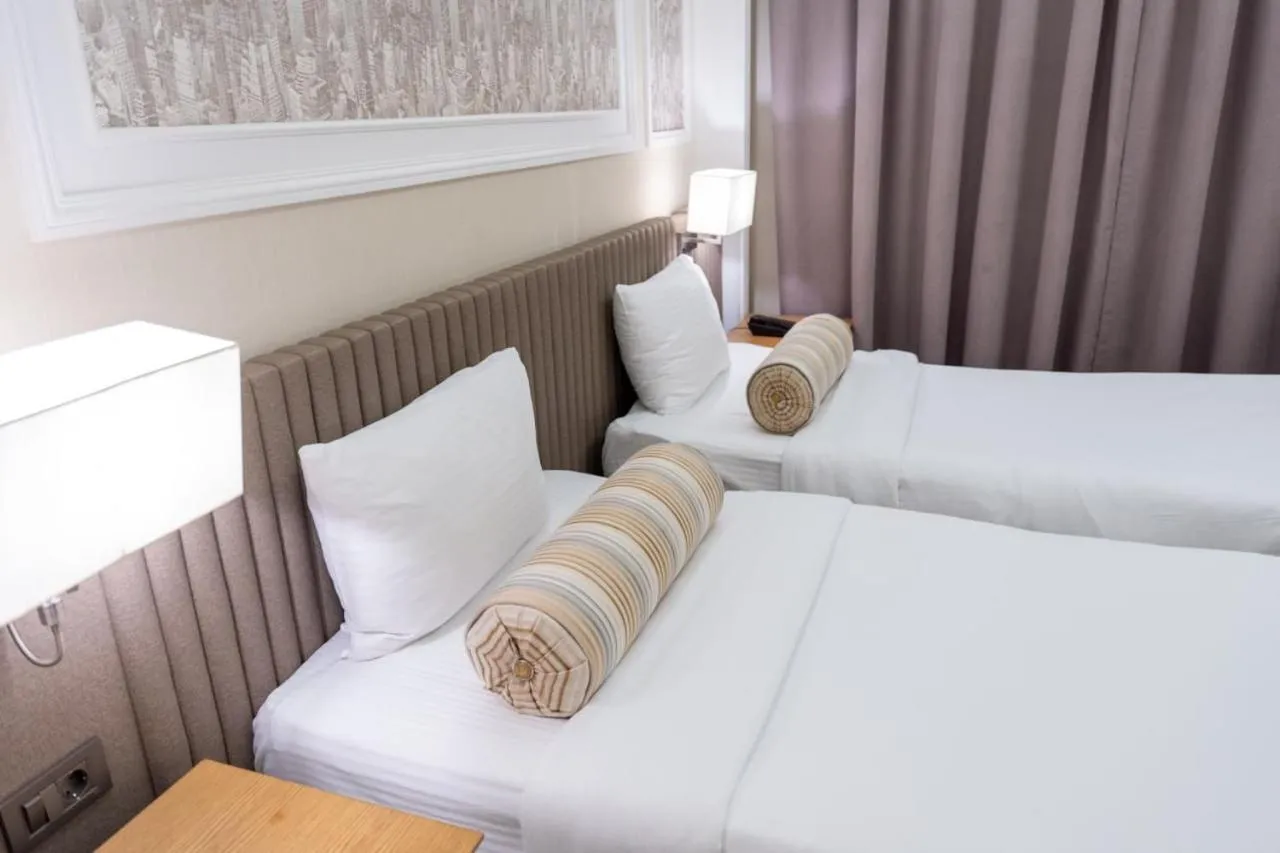 Bed in Theatrum Hotel Baku