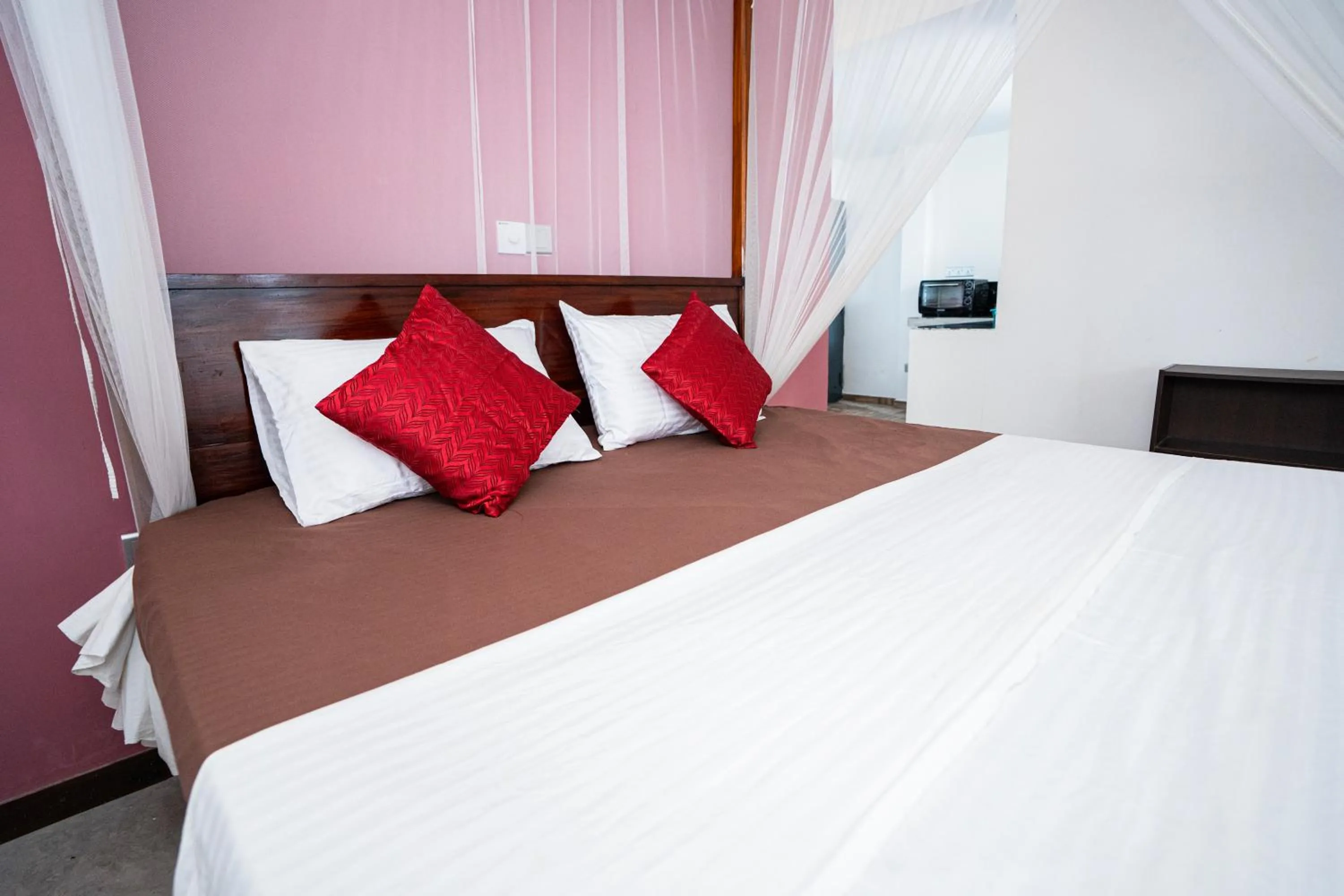 Bed in Hill cottage - ocean view