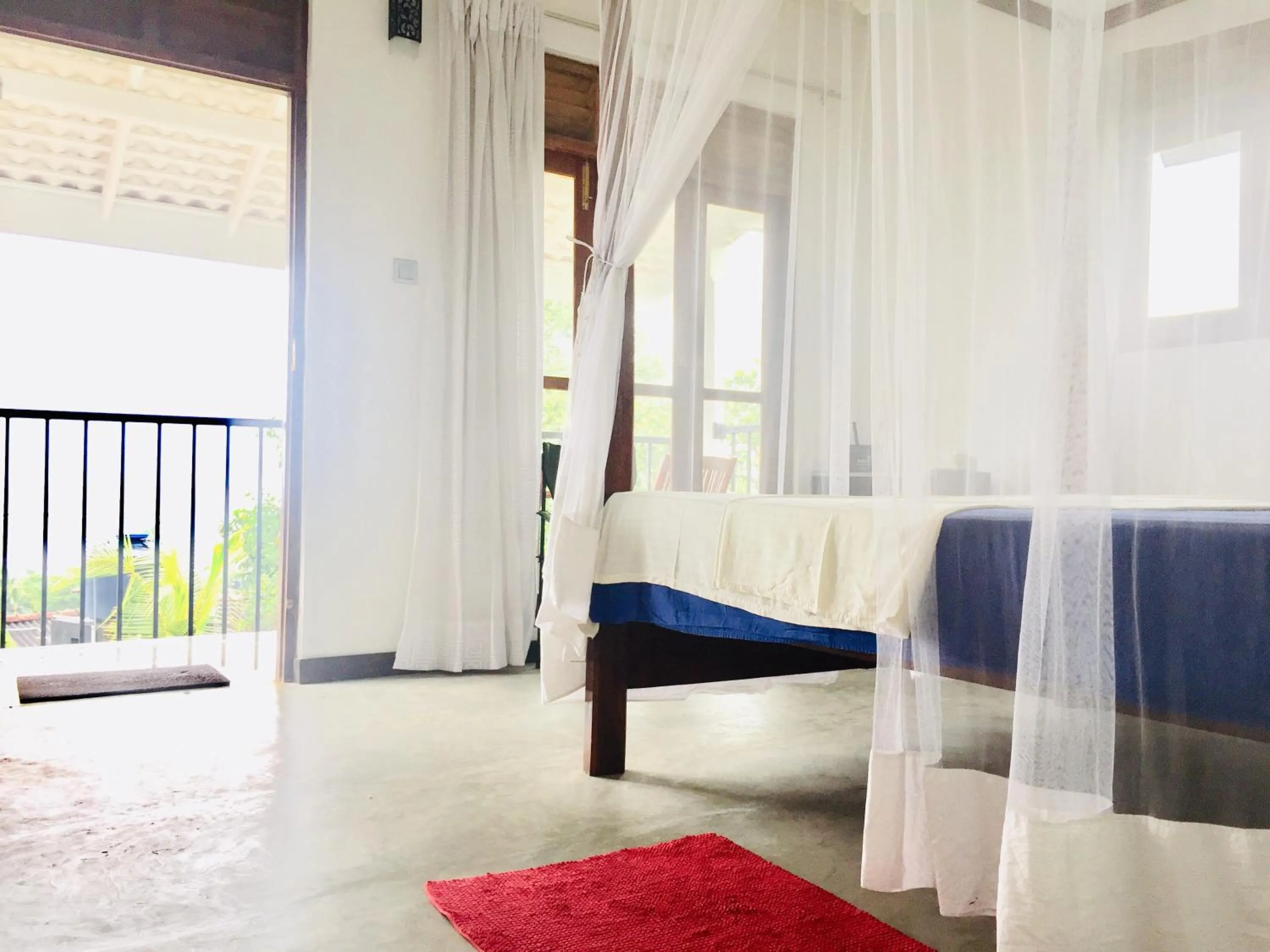 Bed in Hill cottage - ocean view