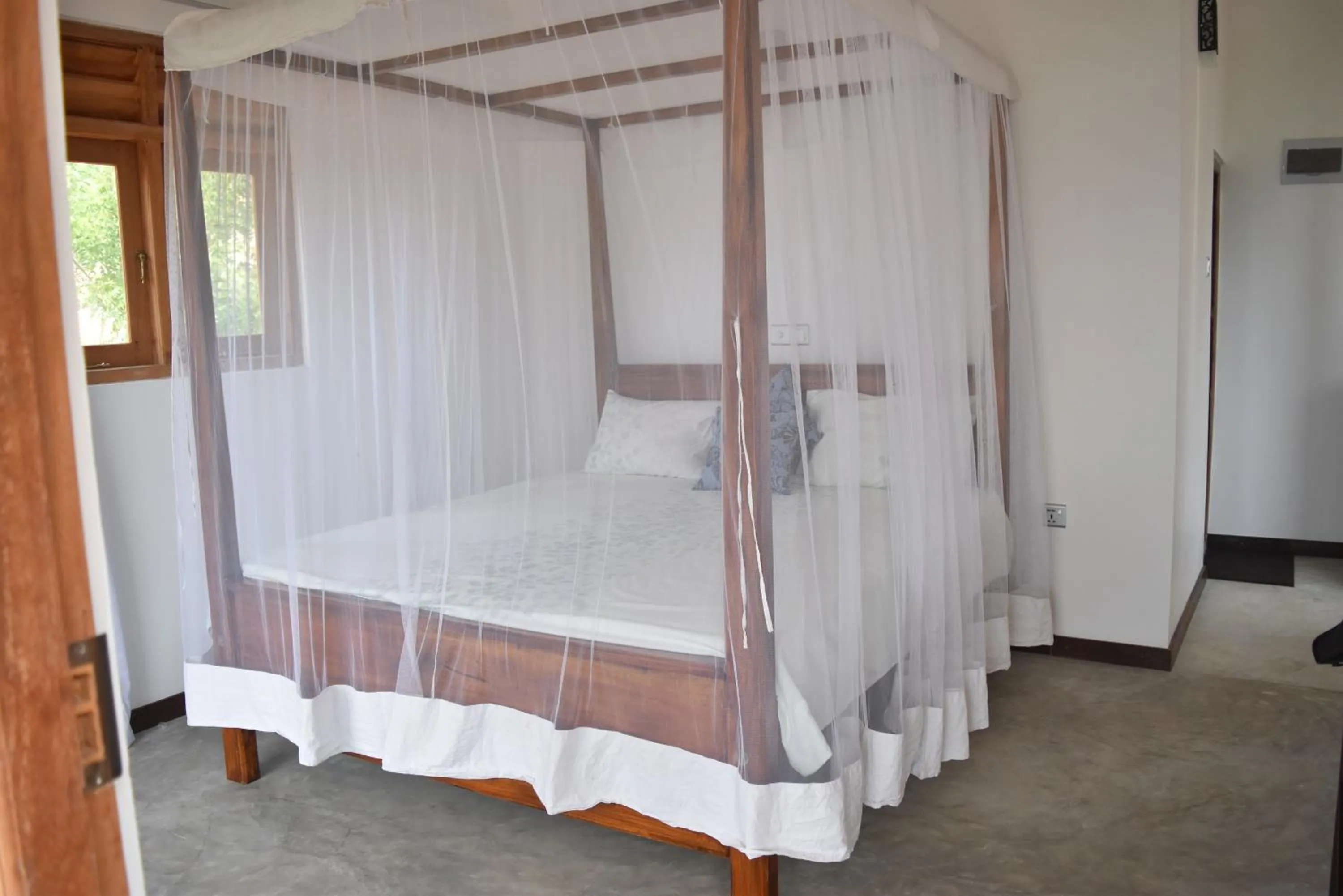 Bed in Hill cottage - ocean view