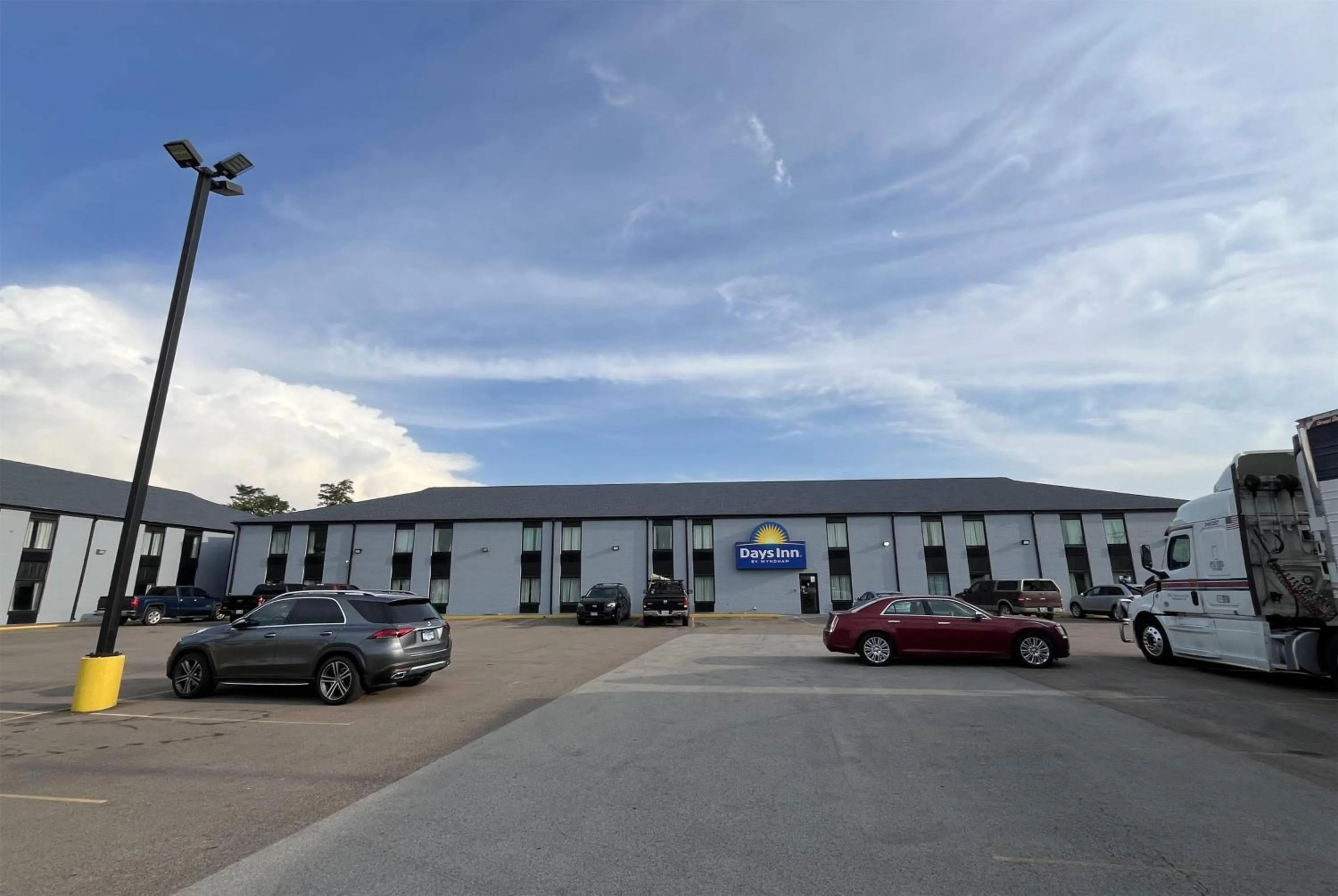 Property building in Days Inn & Suites by Wyndham Bloomington/Normal IL