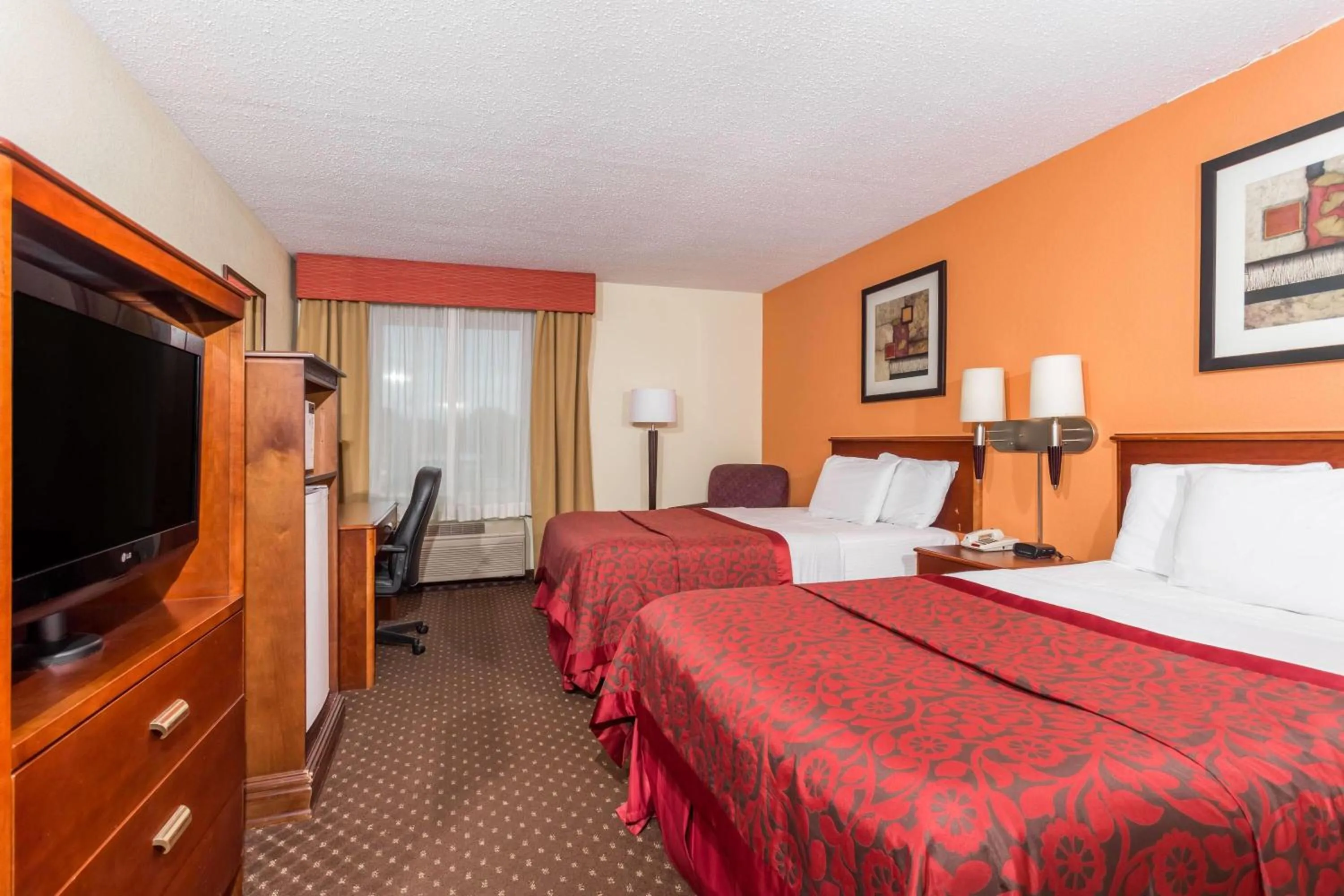 Photo of the whole room, Bed in Days Inn & Suites by Wyndham Bloomington/Normal IL