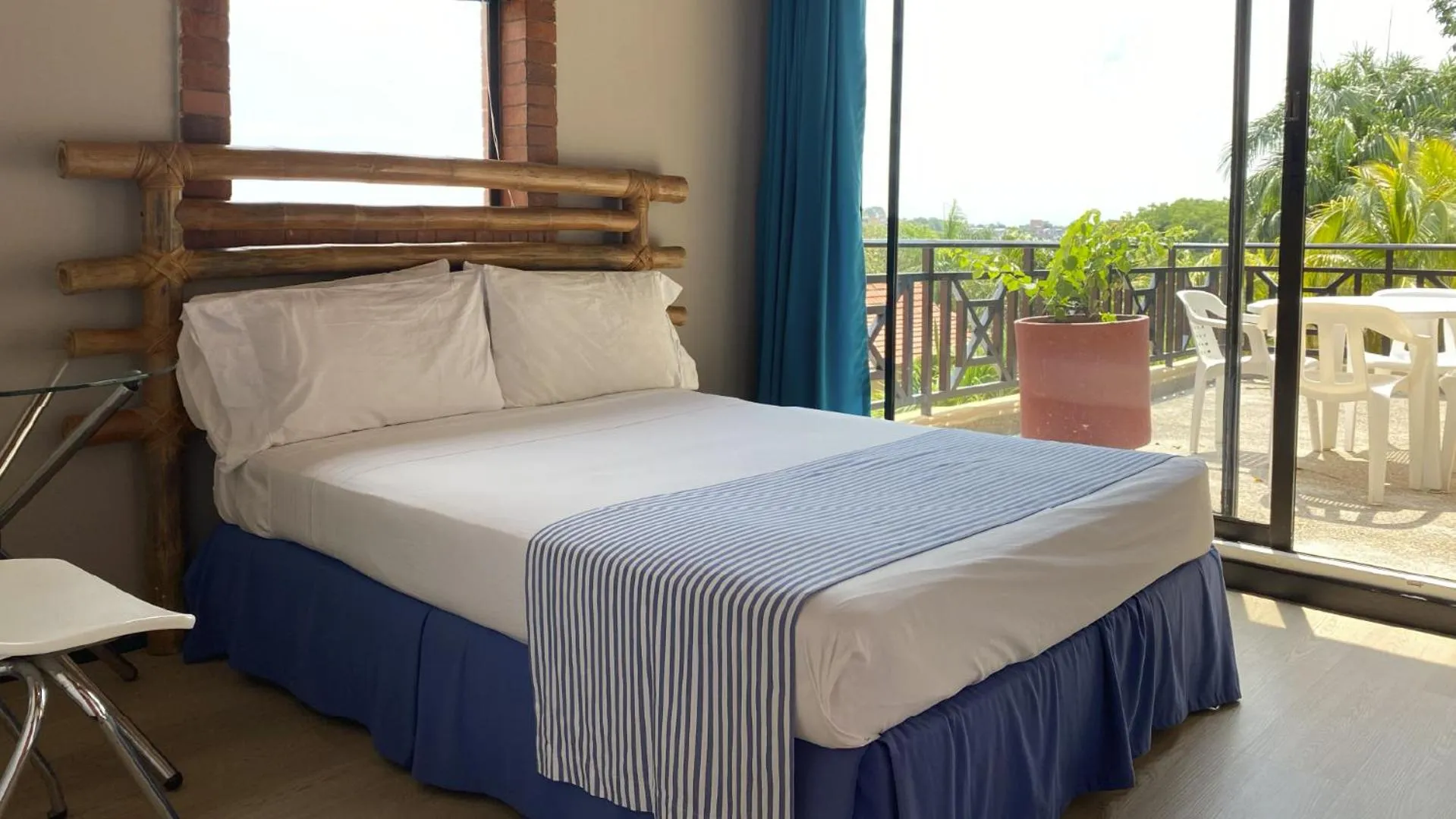 Bed in Hotel Girardot Resort by On Vacation