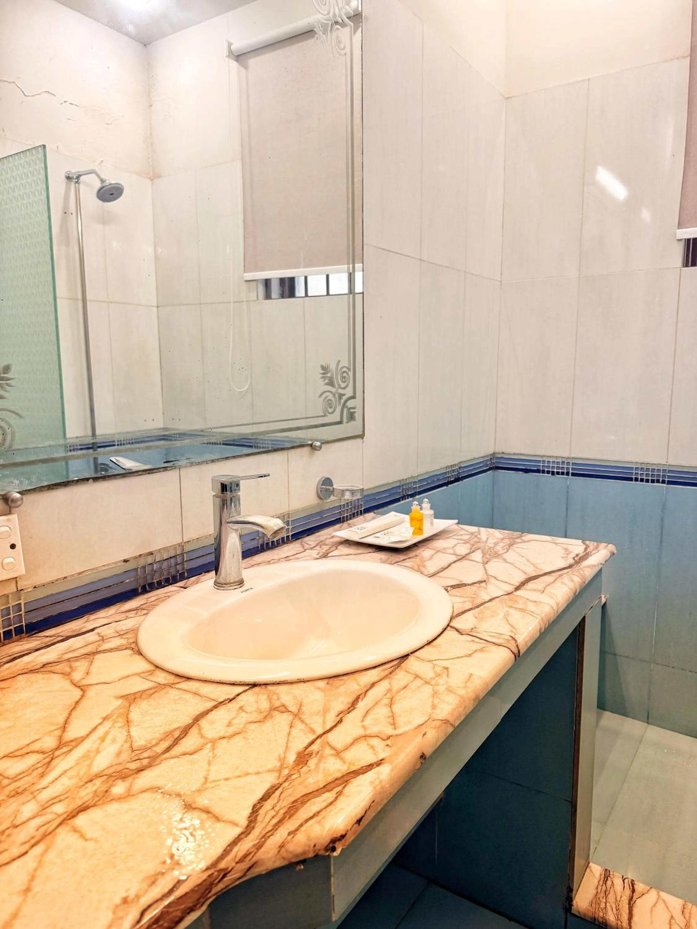 Bathroom in Reina Boutique Hotel - G9