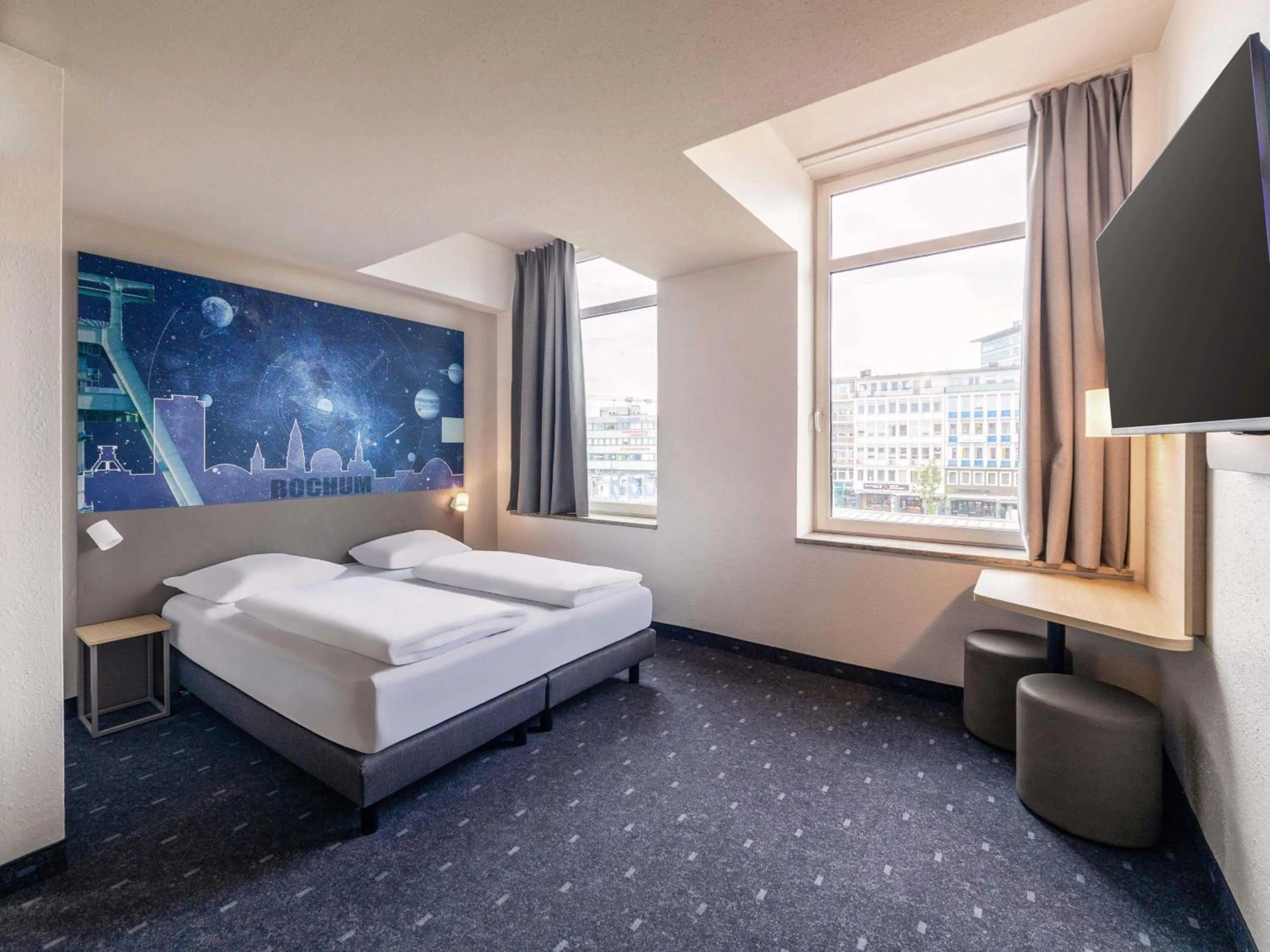 Photo of the whole room, Bed in B&B HOTEL Bochum Hbf-Nord