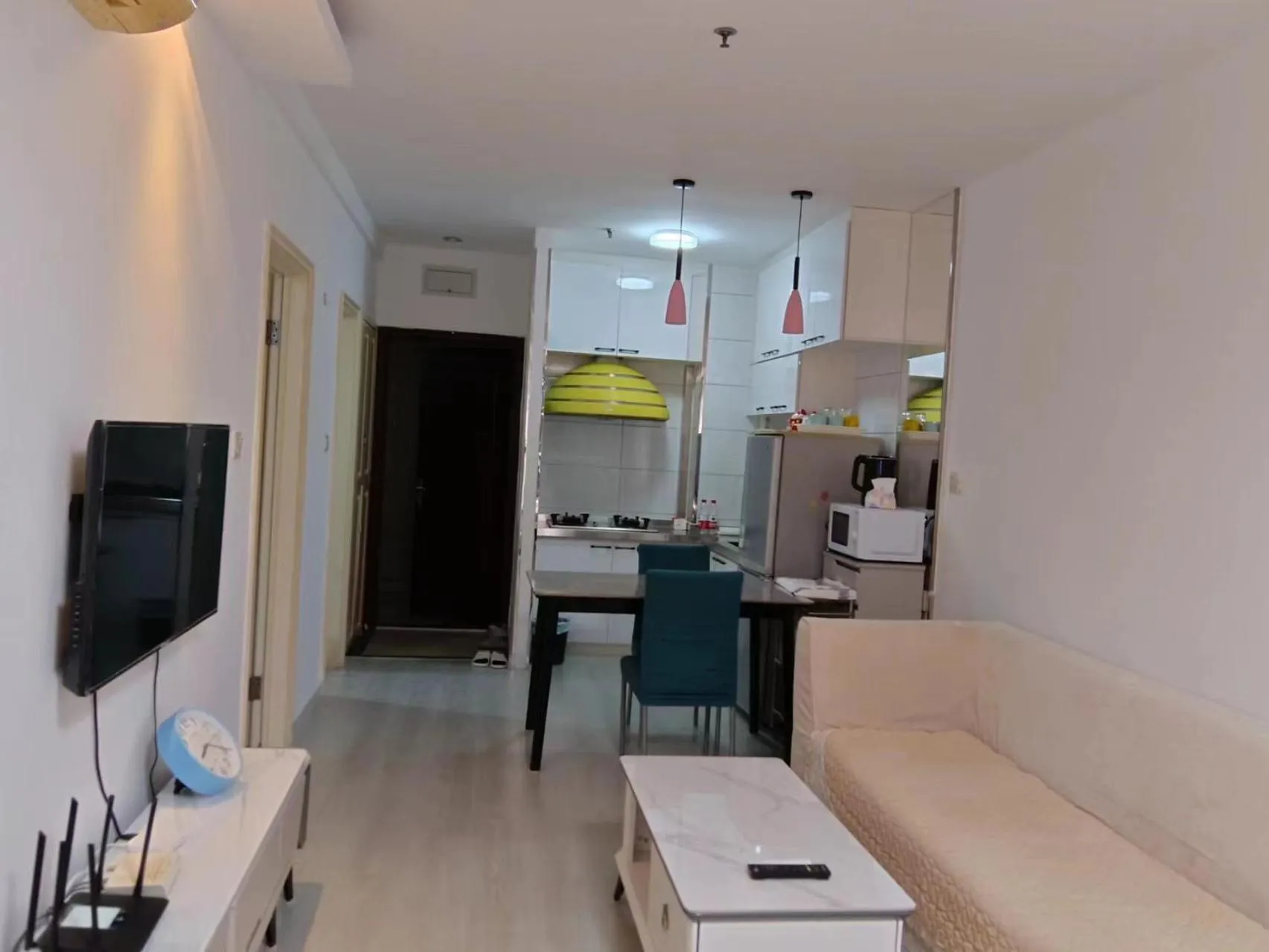 kitchen in Dalian Xiuzhu Mansion Apartment