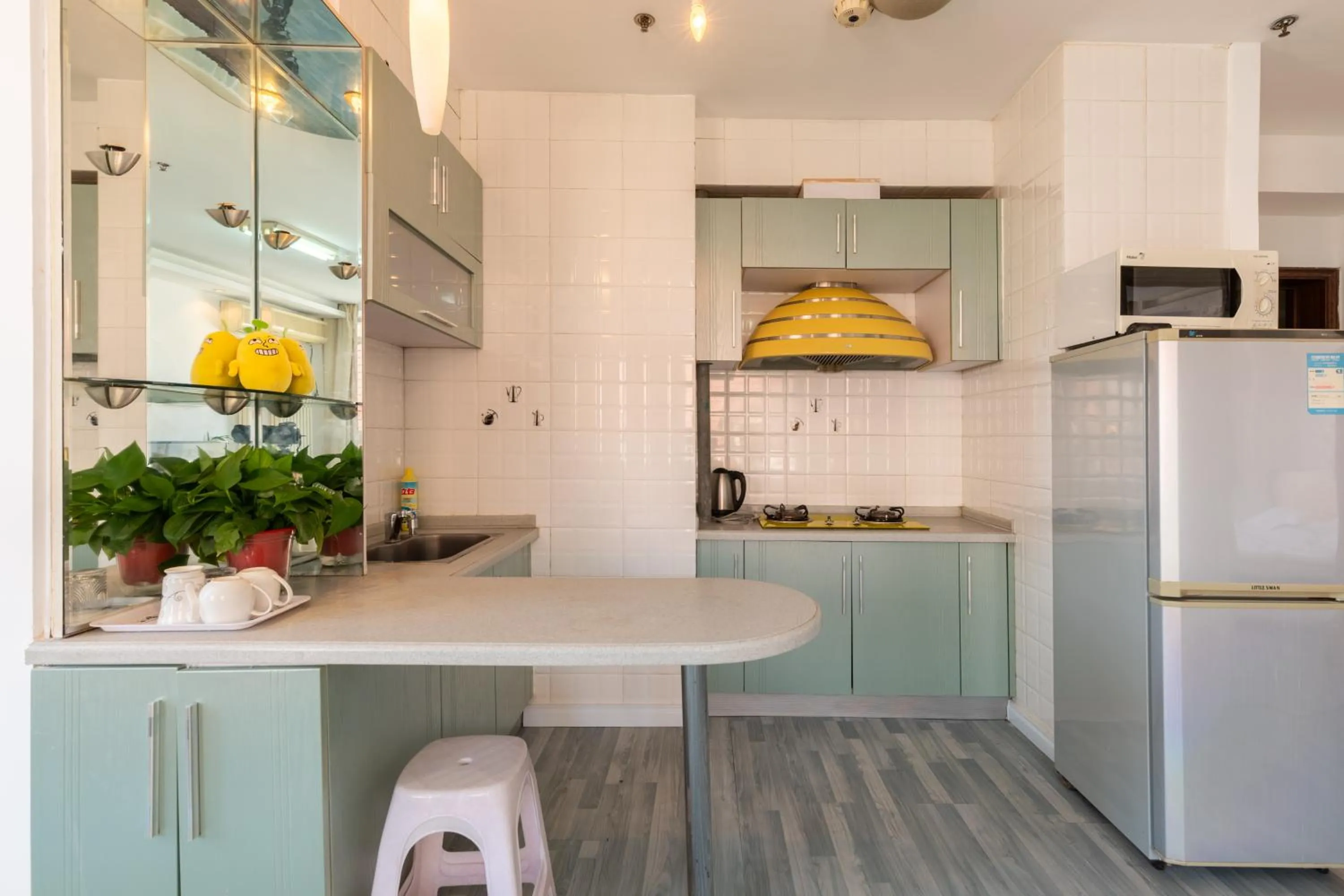 Kitchen or kitchenette in Dalian Xiuzhu Mansion Apartment