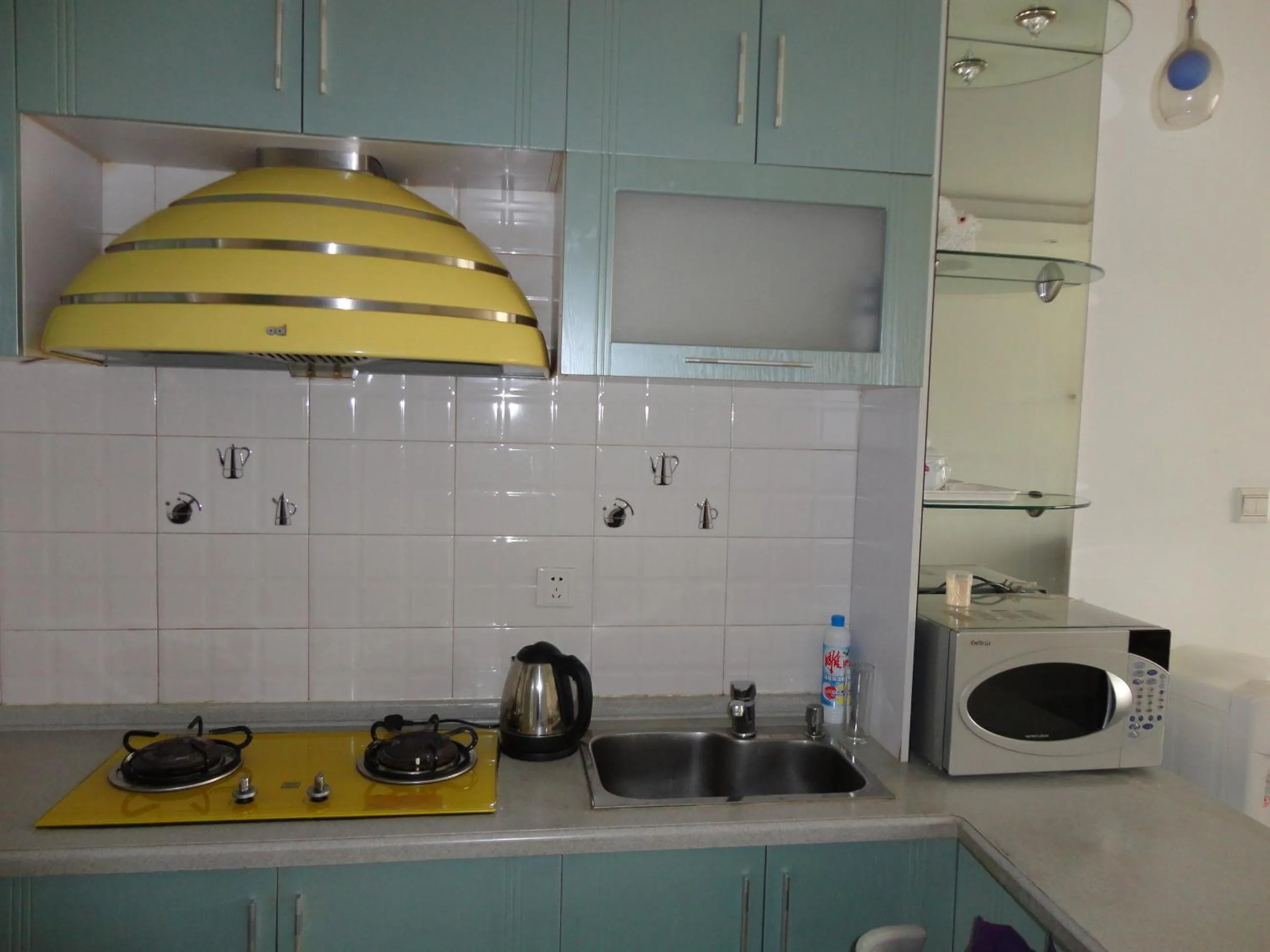 Kitchen or kitchenette in Dalian Xiuzhu Mansion Apartment