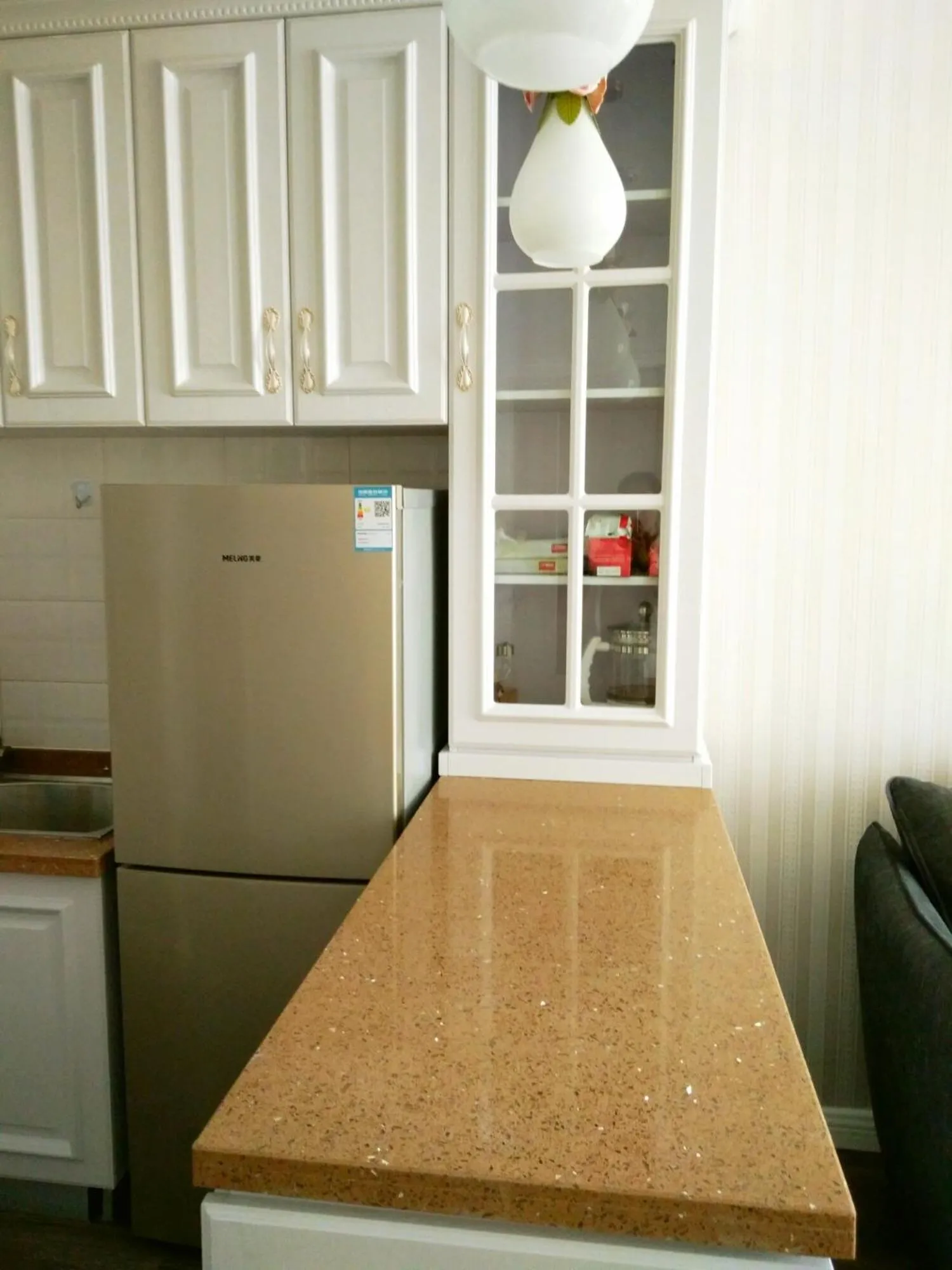 Kitchen or kitchenette in Dalian Xiuzhu Mansion Apartment