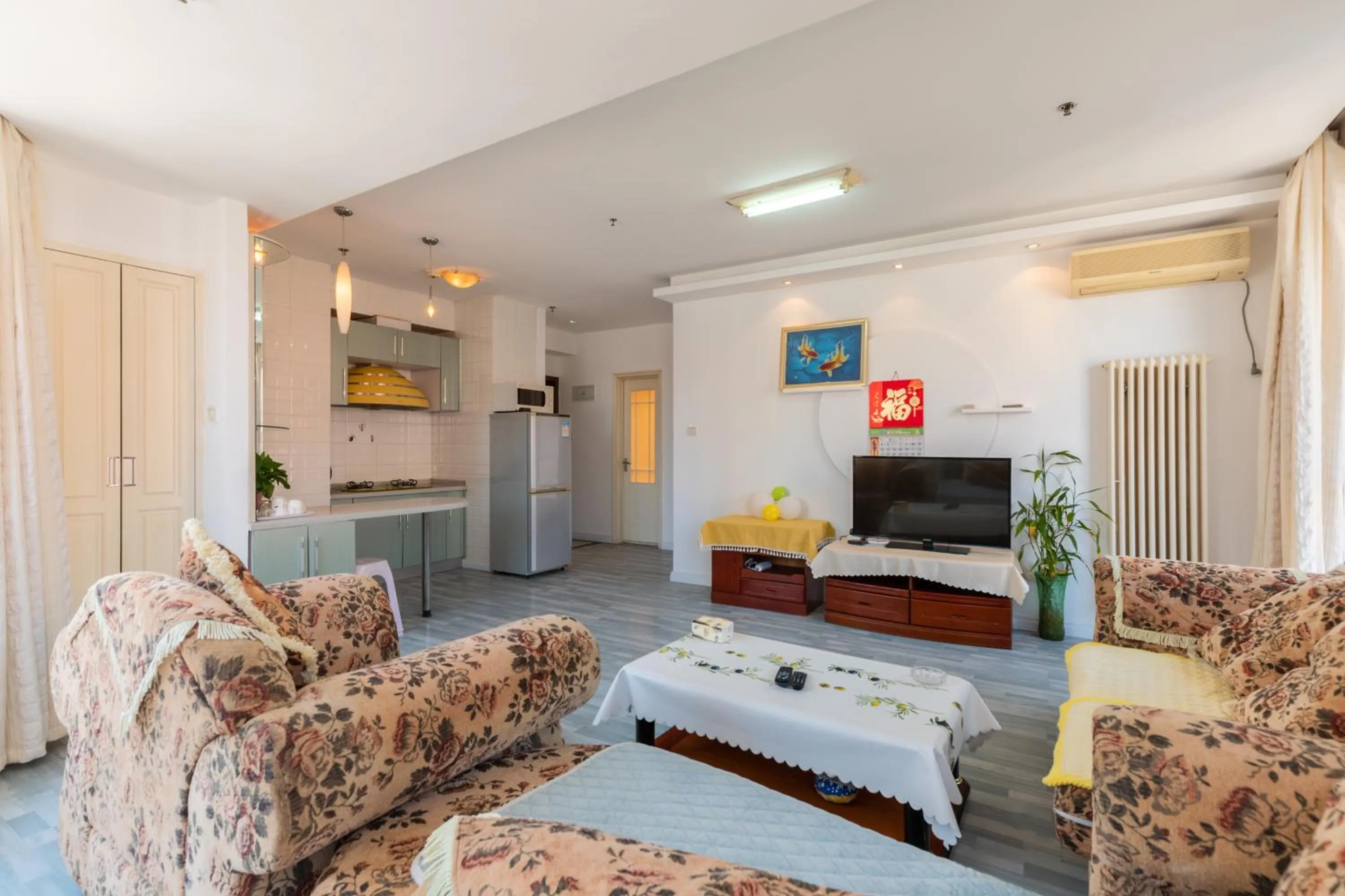 TV and multimedia in Dalian Xiuzhu Mansion Apartment