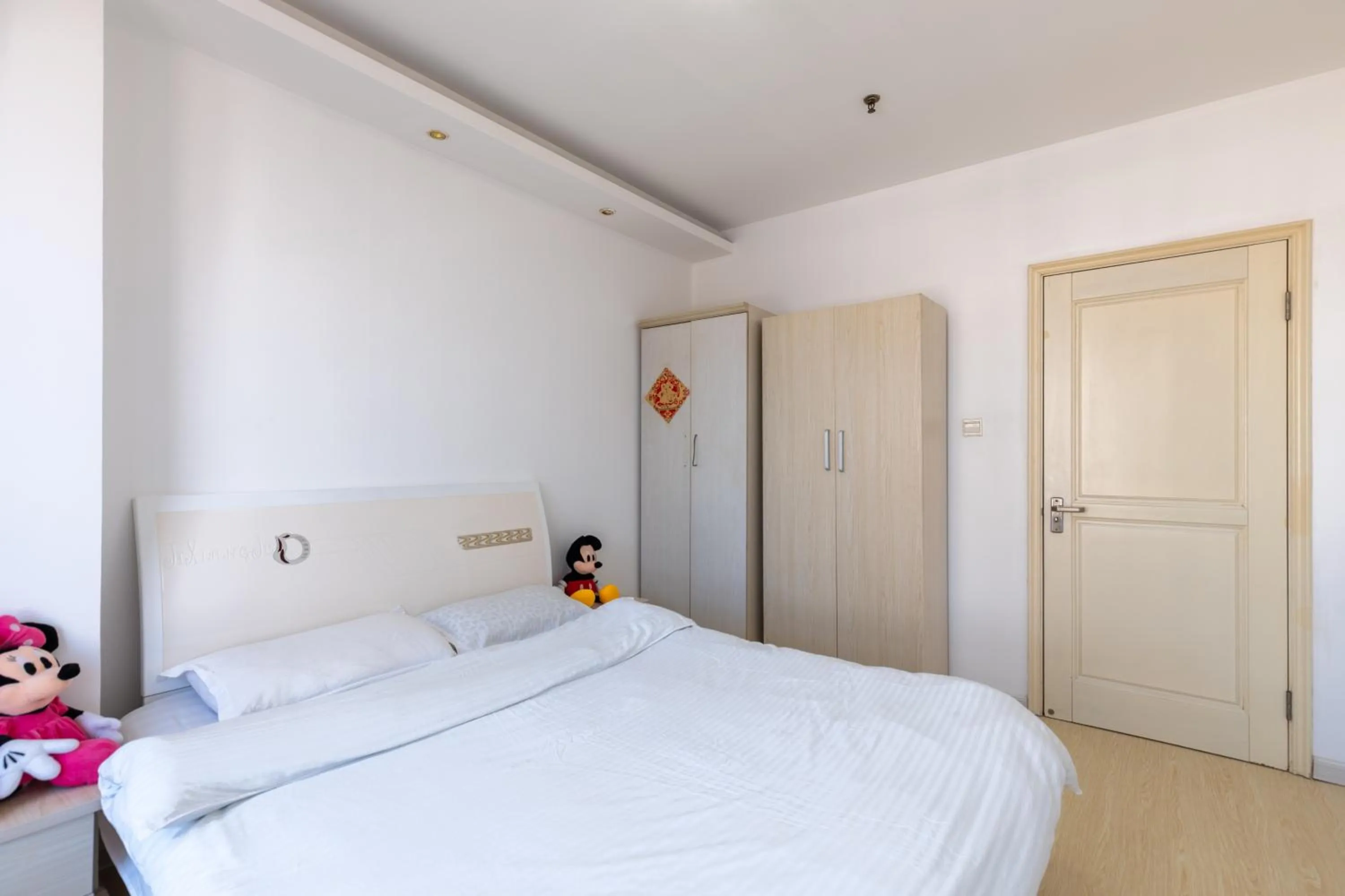 Photo of the whole room, Bed in Dalian Xiuzhu Mansion Apartment