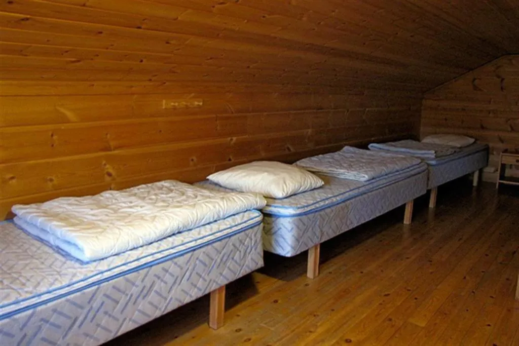 Bed in Koivula Cottages
