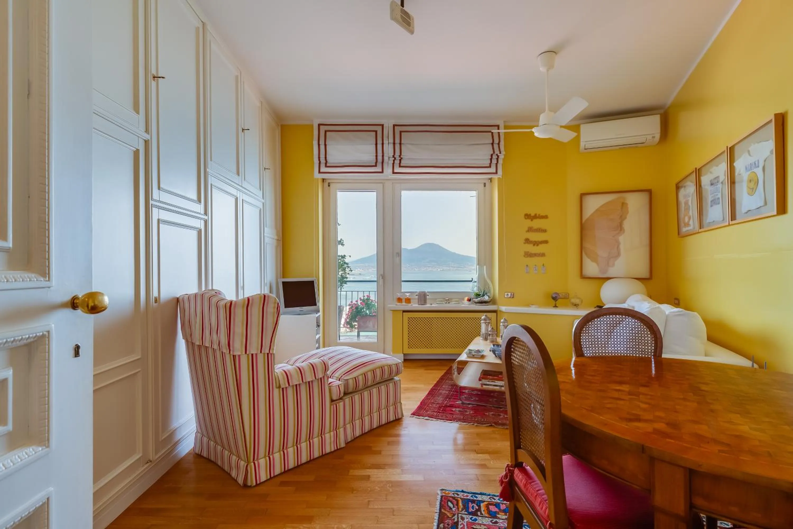 Living room in O-House Posillipo by Napoliapartments