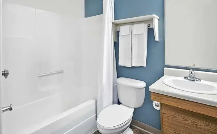 Bathroom in WoodSpring Suites Holland - Grand Rapids