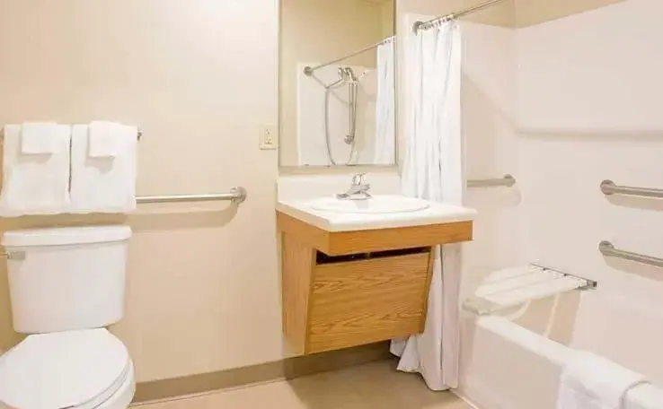 Bathroom in WoodSpring Suites Holland - Grand Rapids