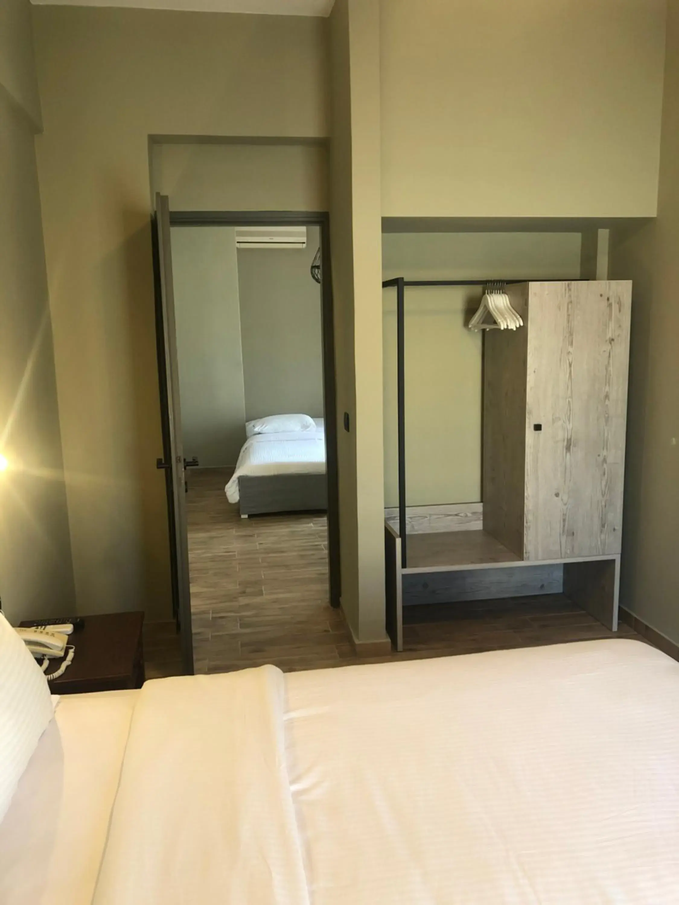 Bedroom, Bed in Petousis Hotel & Suites Bedroom, Bed in Petousis Hotel & Suites