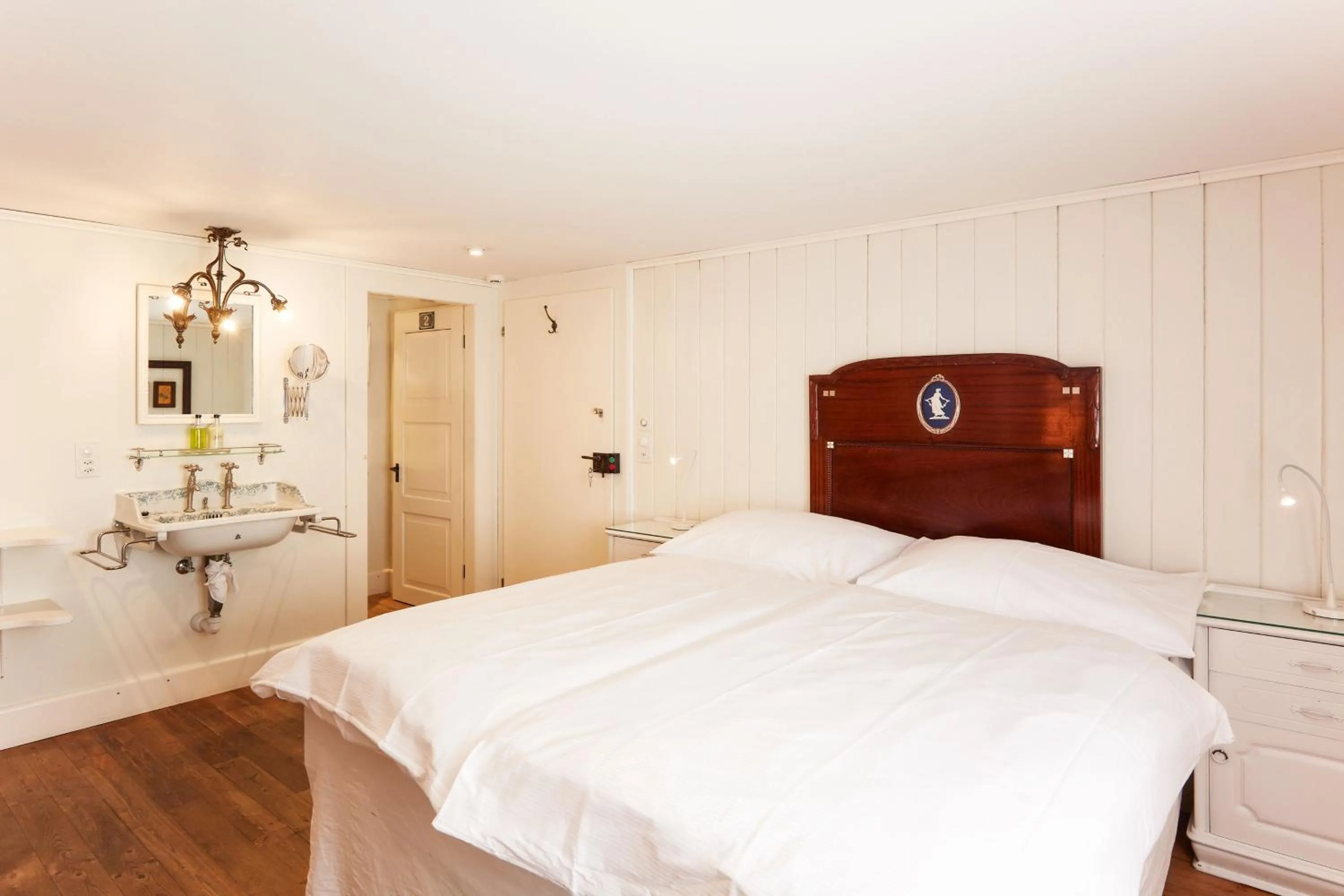 Bed in Boutique-Hotel Schlüssel