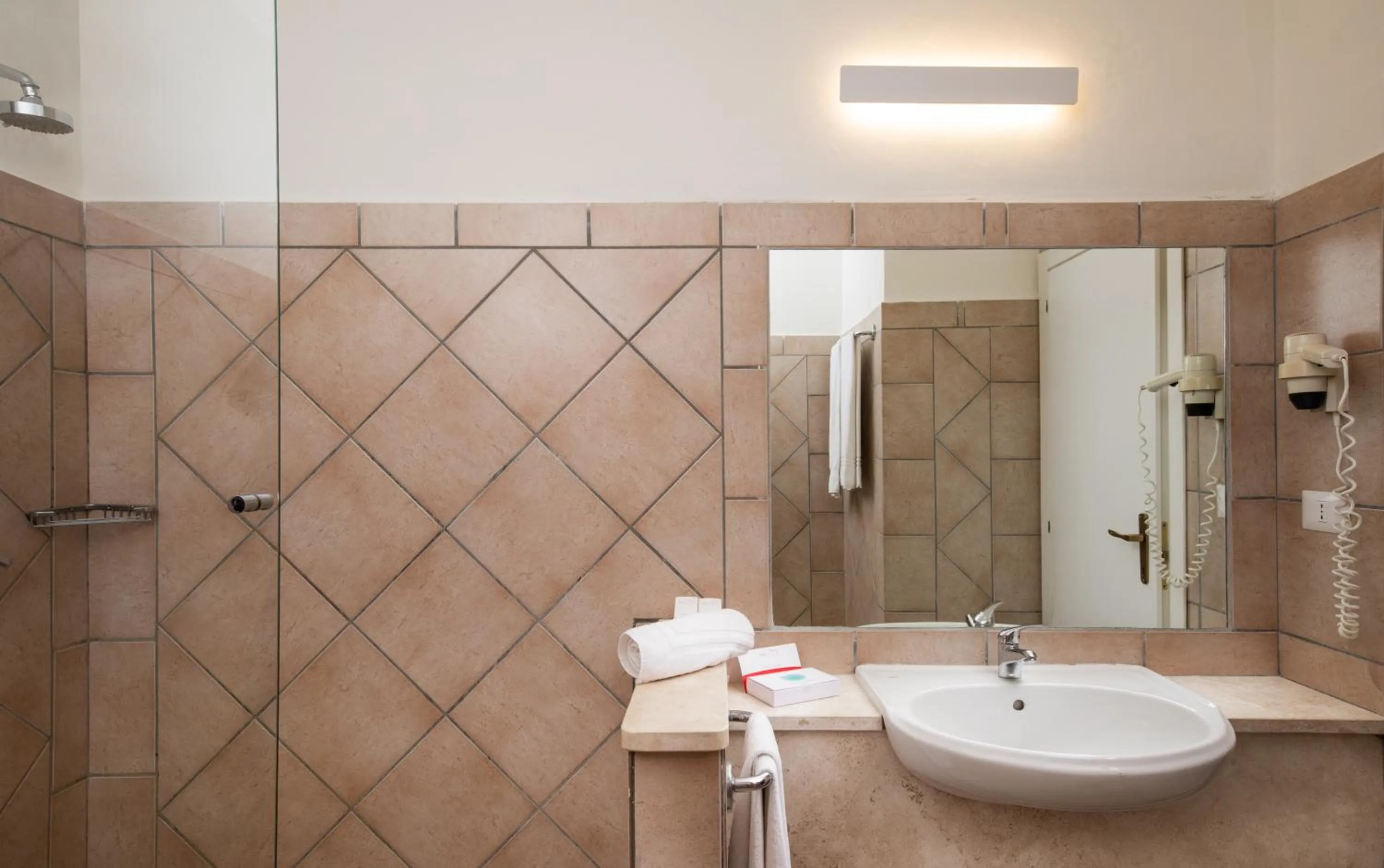 Bathroom in VOI Colonna Village