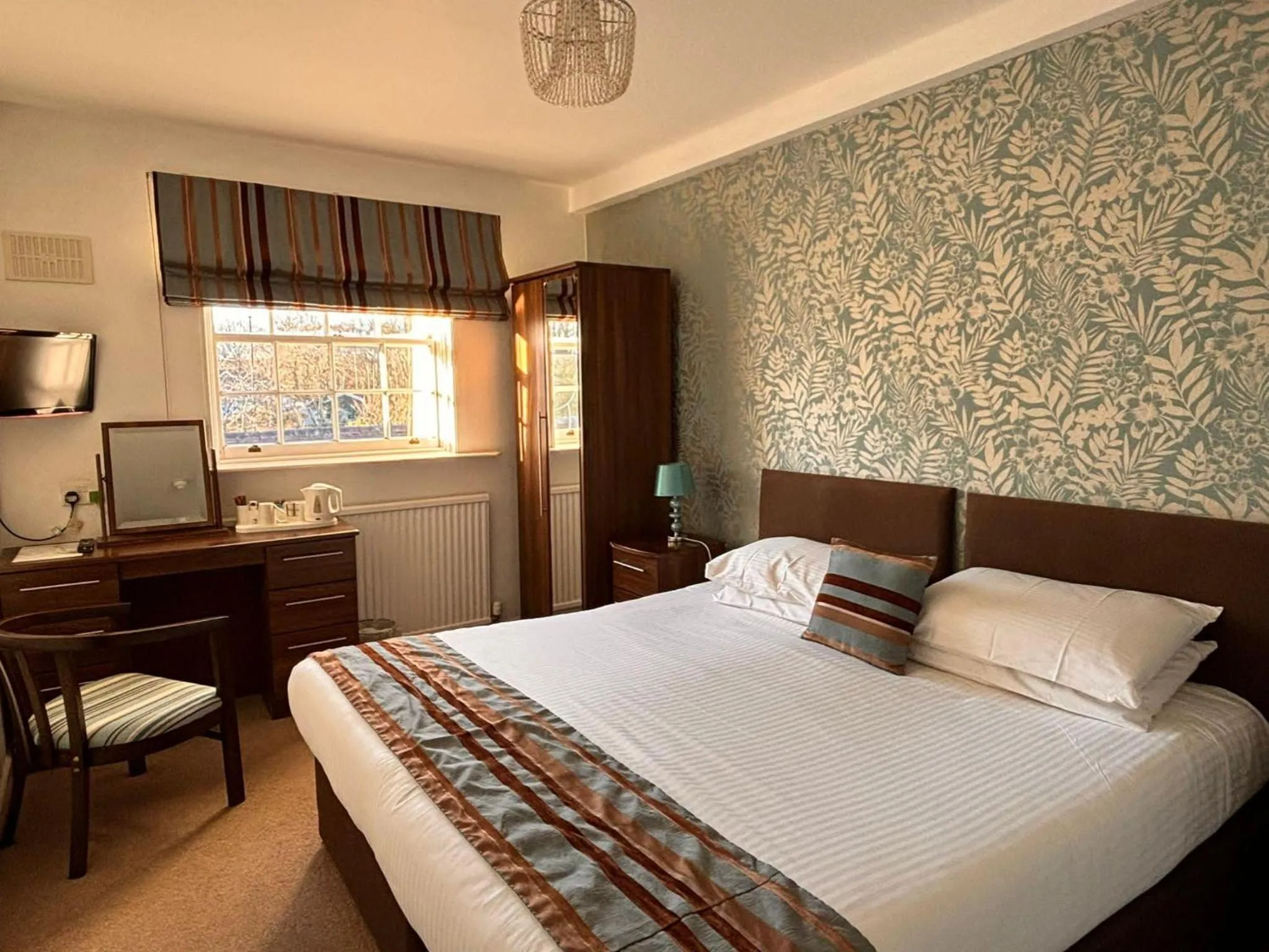 Bed in The Mill House Hotel