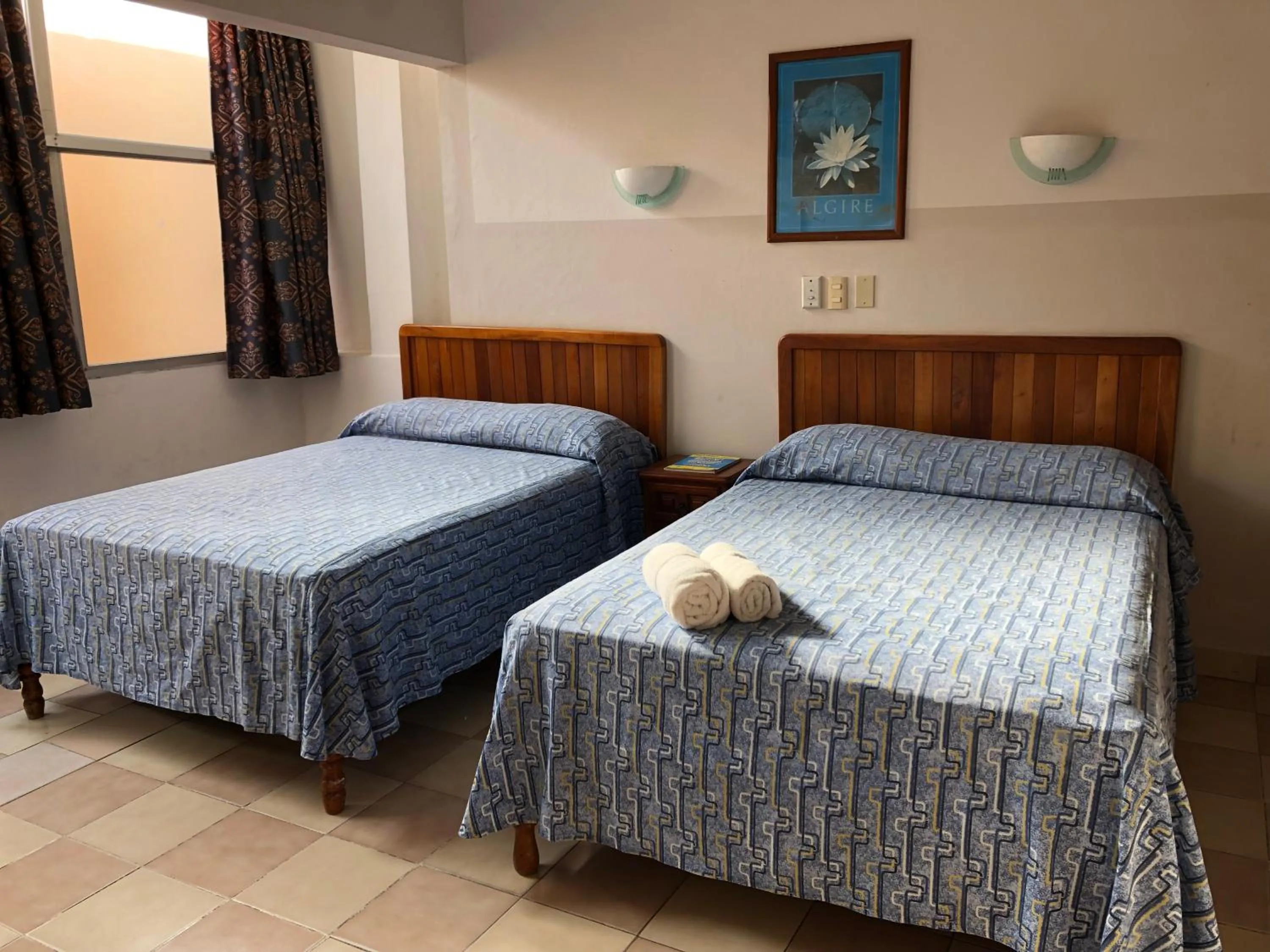 Photo of the whole room, Bed in Hotel El Faro Malecon