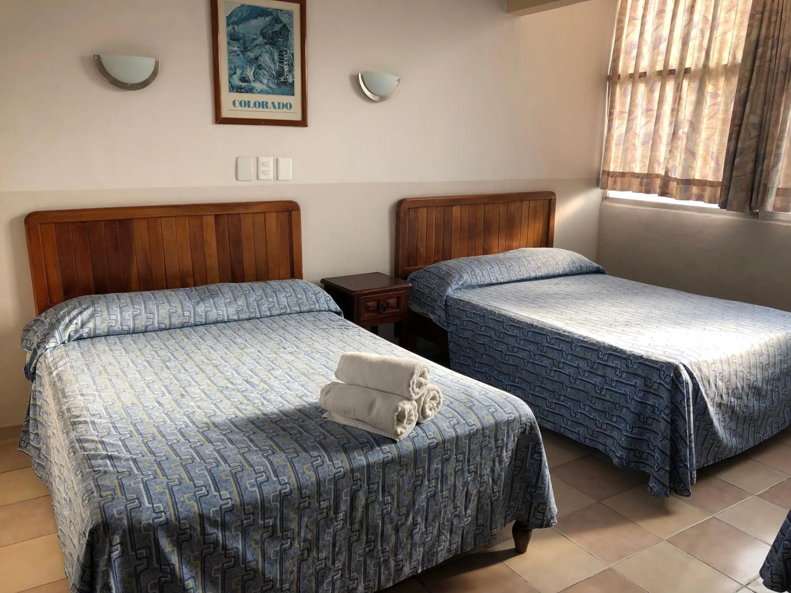 Bed in Hotel El Faro Malecon