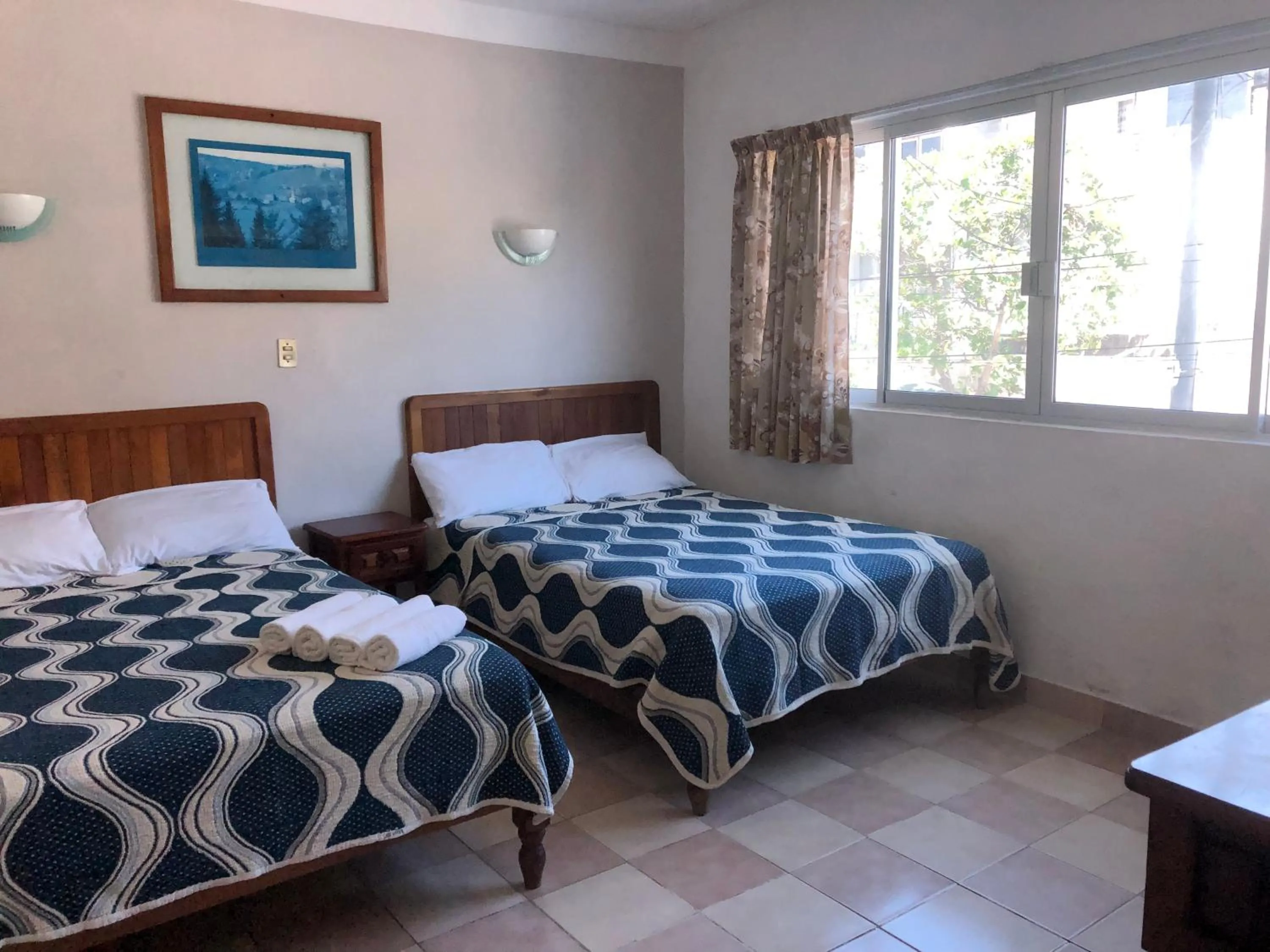 Photo of the whole room, Bed in Hotel El Faro Malecon