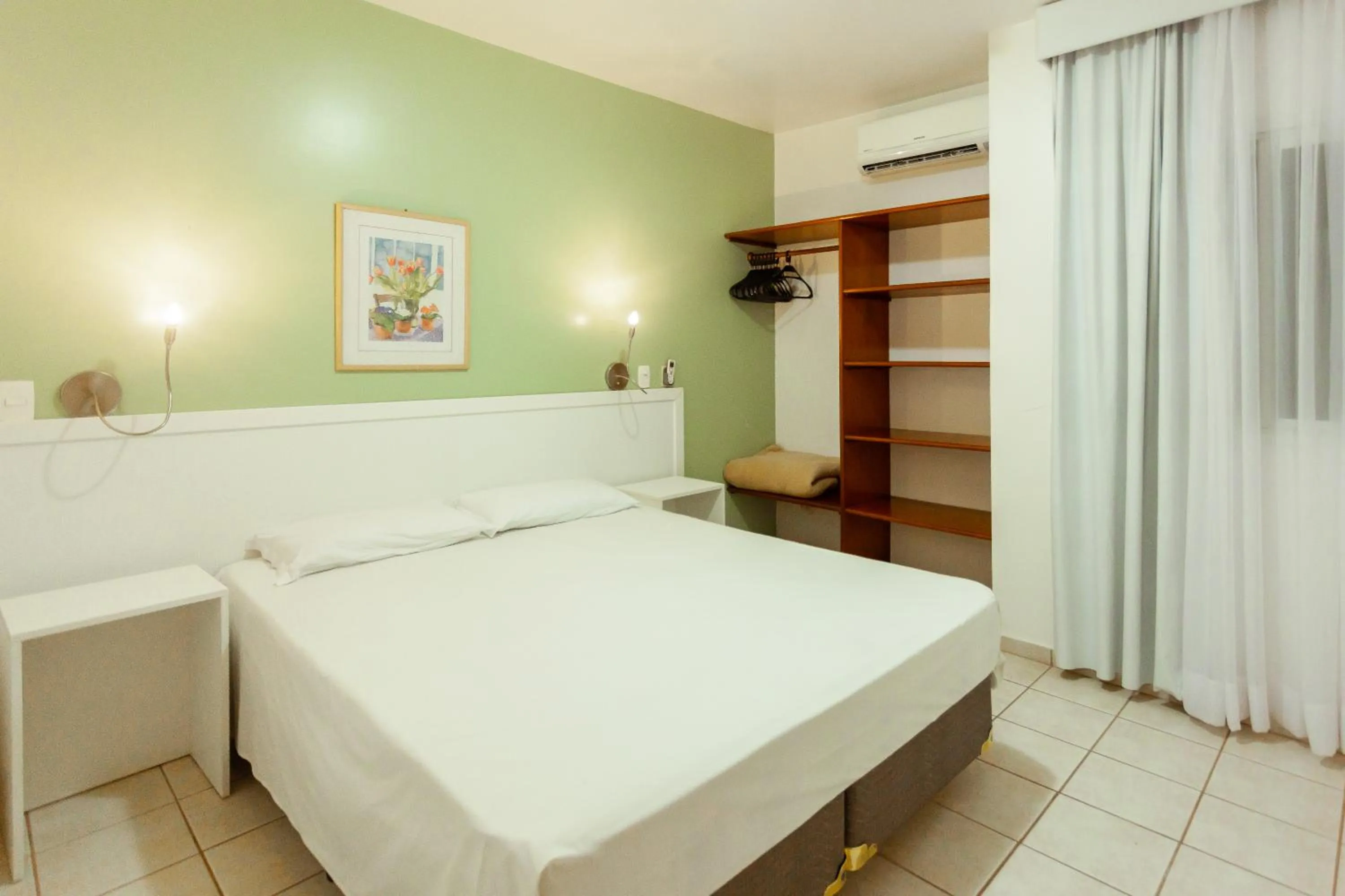 Bed in Vistabela Resort & Spa