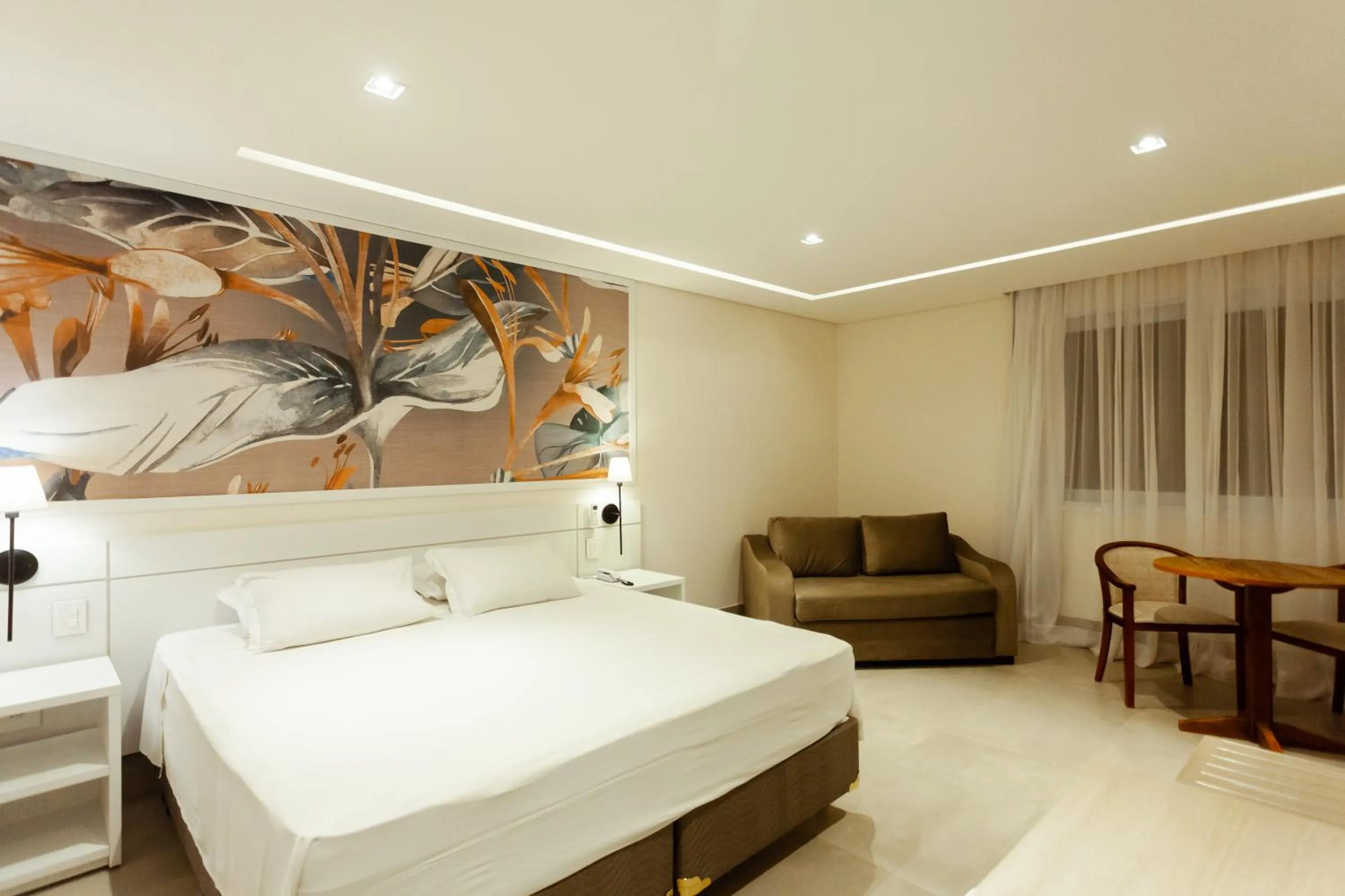 Bed in Vistabela Resort & Spa