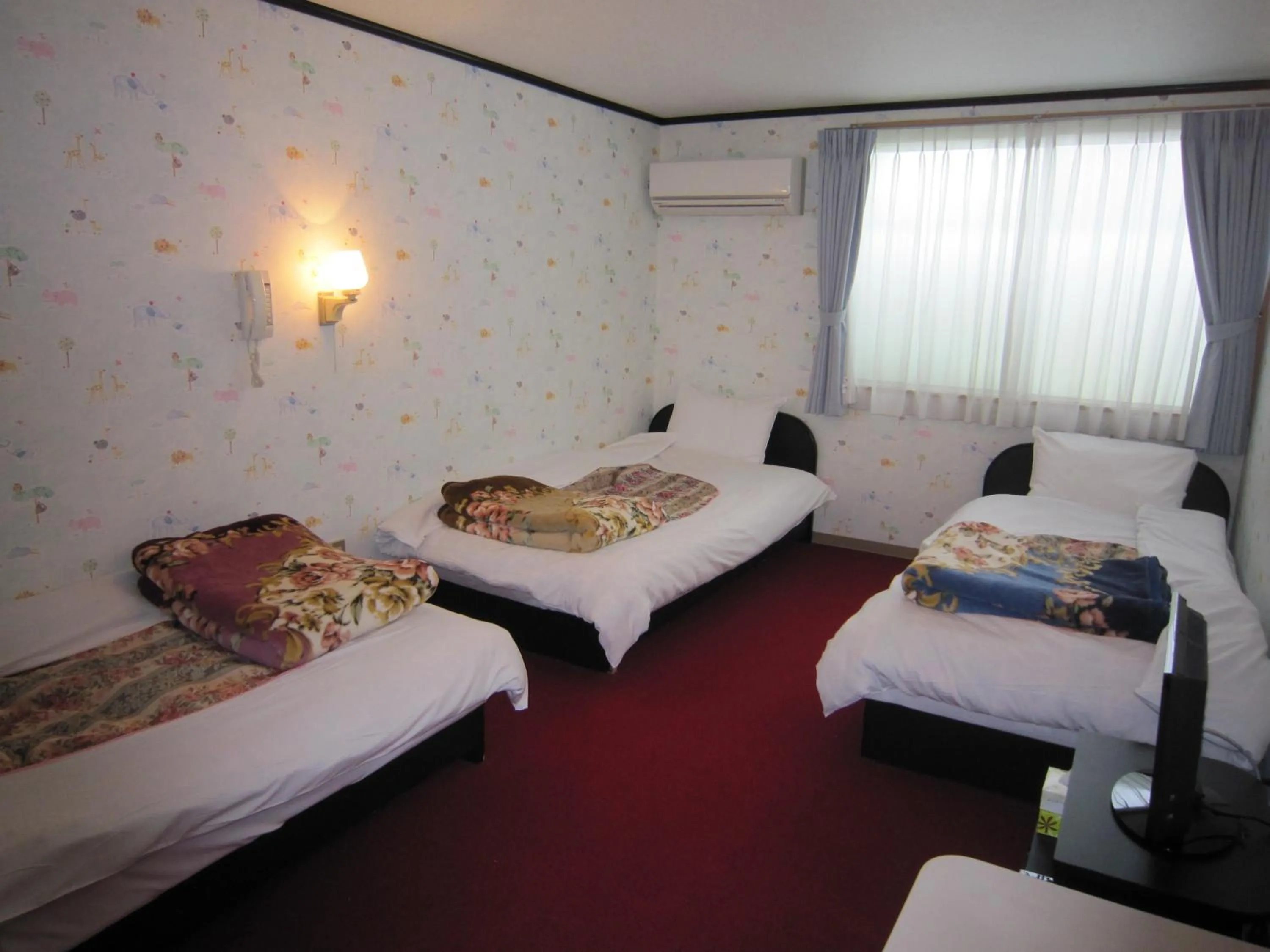 Bed in Pension Kitashirakawa